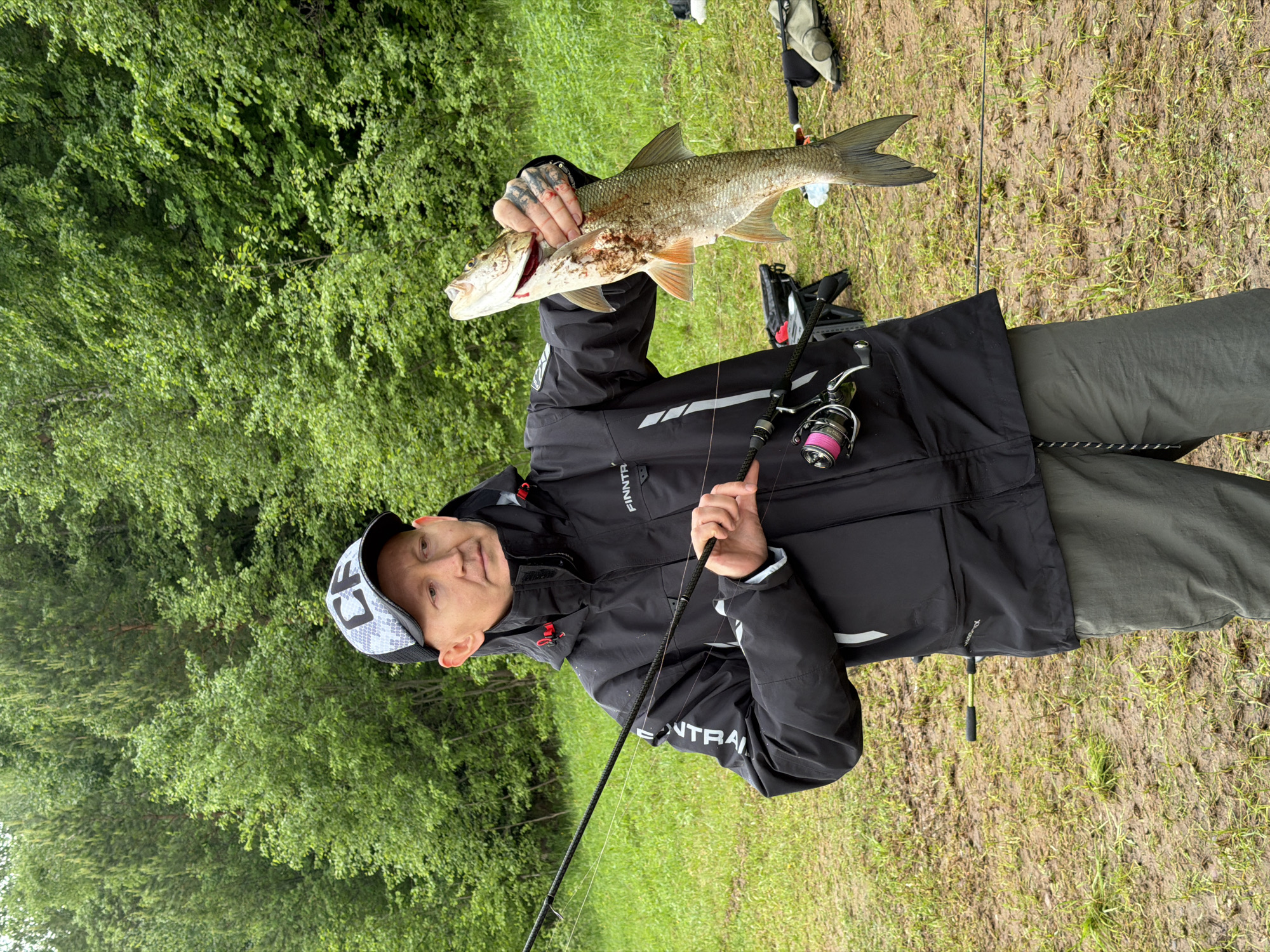 Angler displays catch in Ольховка, Russia