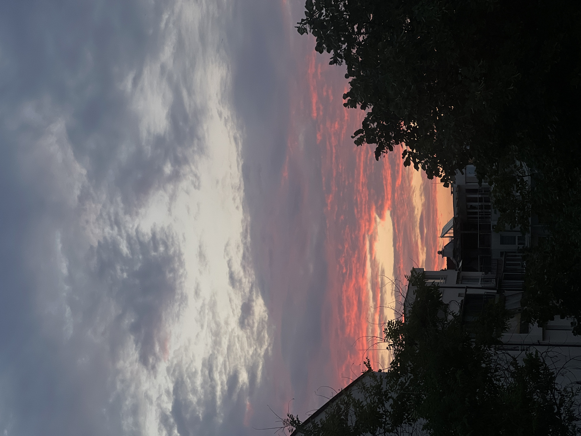 Vivid sunset paints the Plovdiv skyline in pink and orange