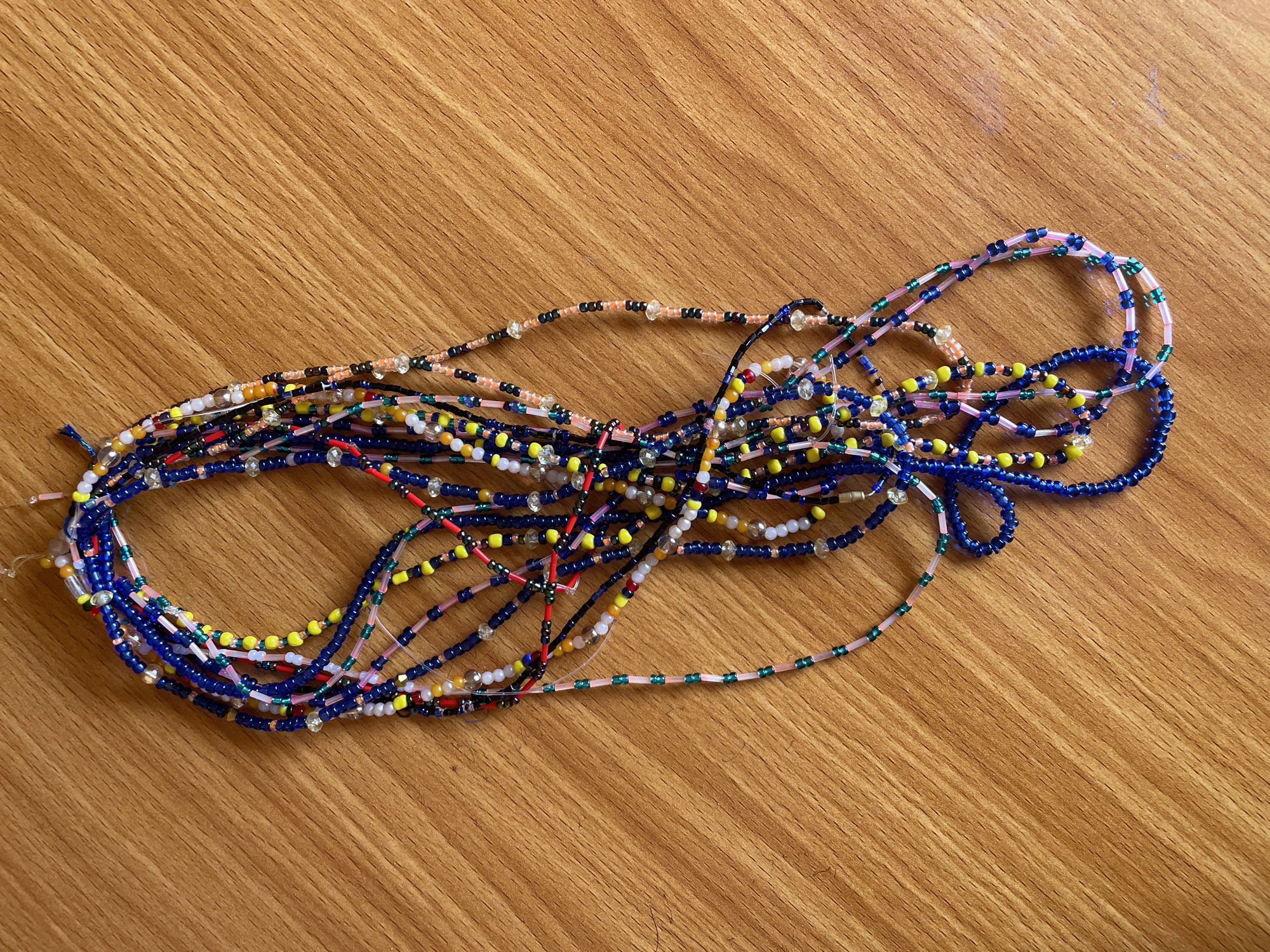 Beaded jewelry and school courtyard life in Television, Nigeria