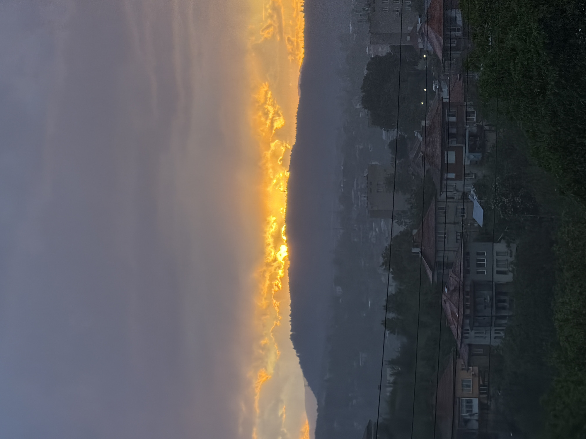 Golden sunset observed through clouds over Kardzhali, Bulgaria