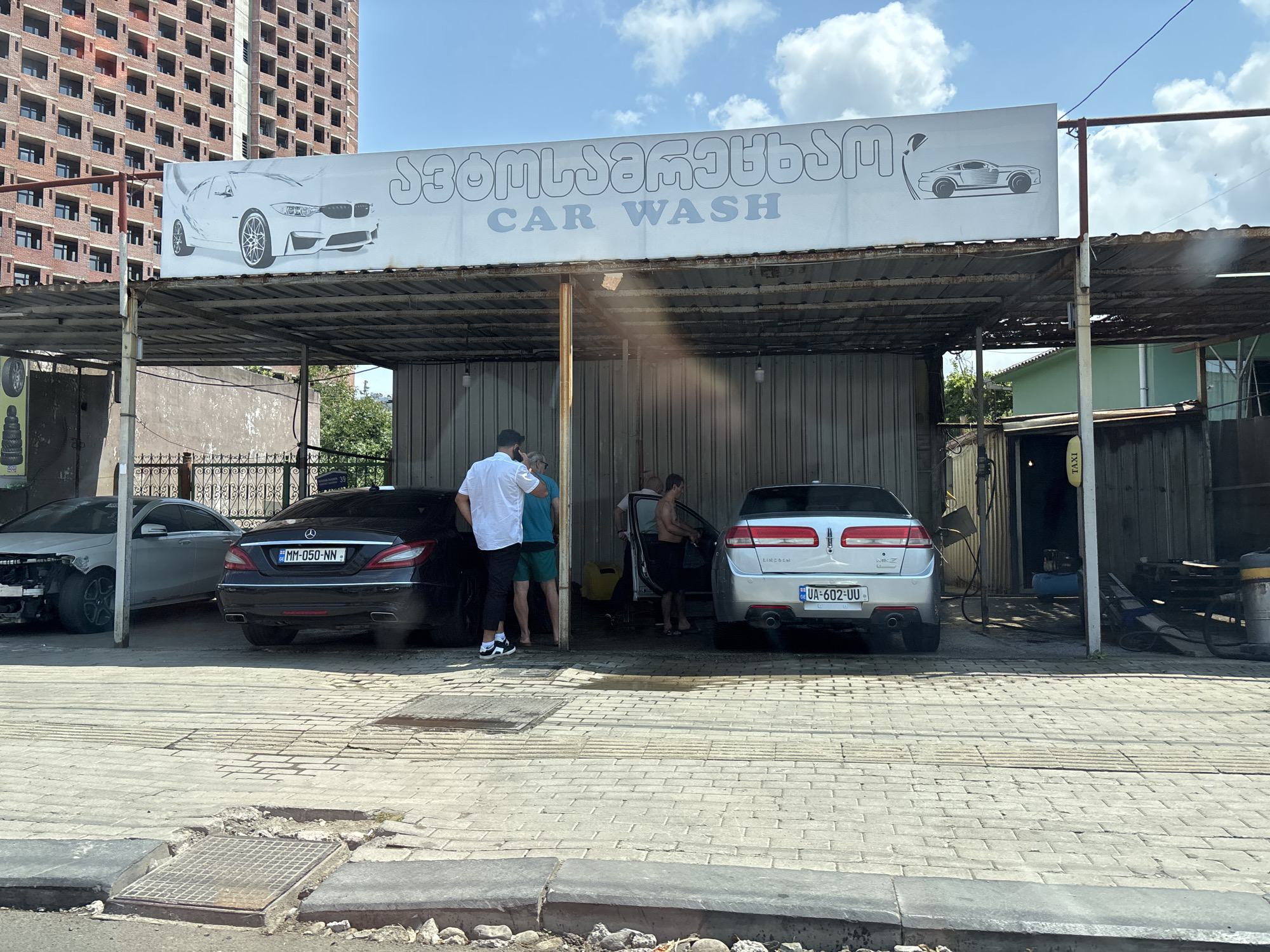 Batumi street scenes: construction, car wash, and urban growth