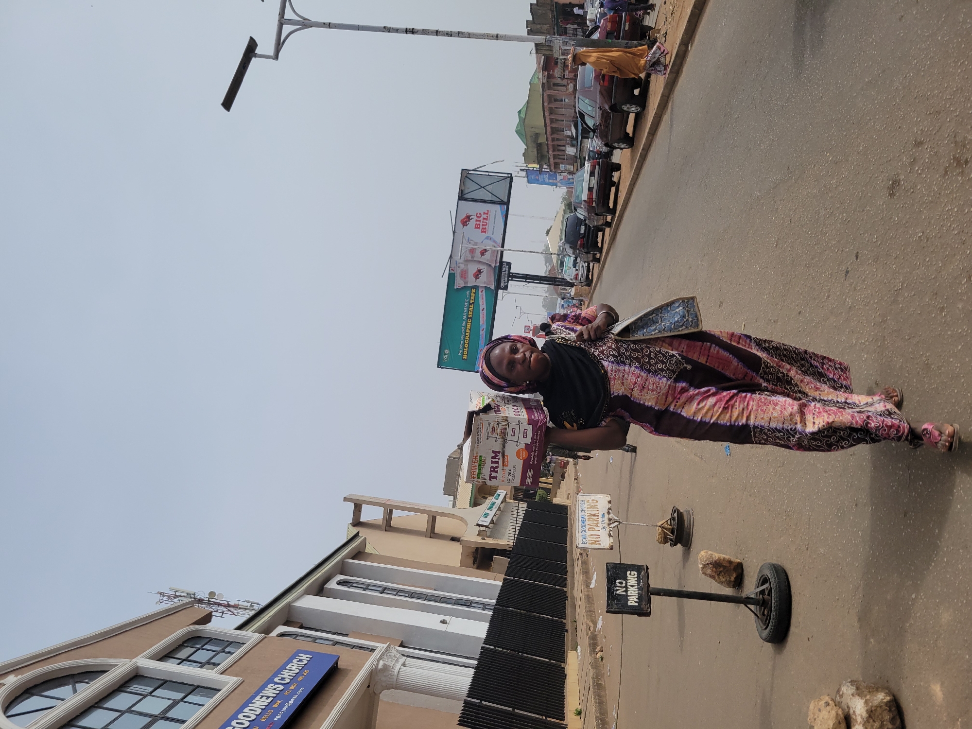 Midday street vendor activity documented in Jos, Nigeria