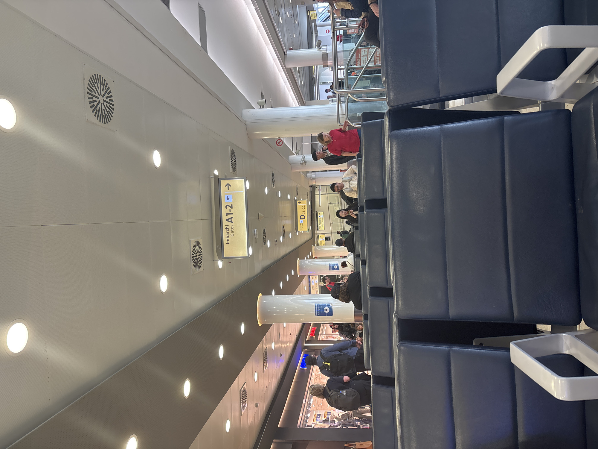 Morning scene documented at Naples airport departure gates