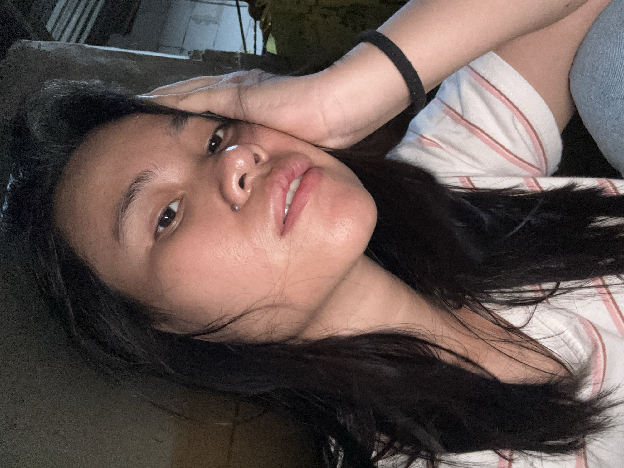Selfie session in a dim East Jakarta room, various expressions