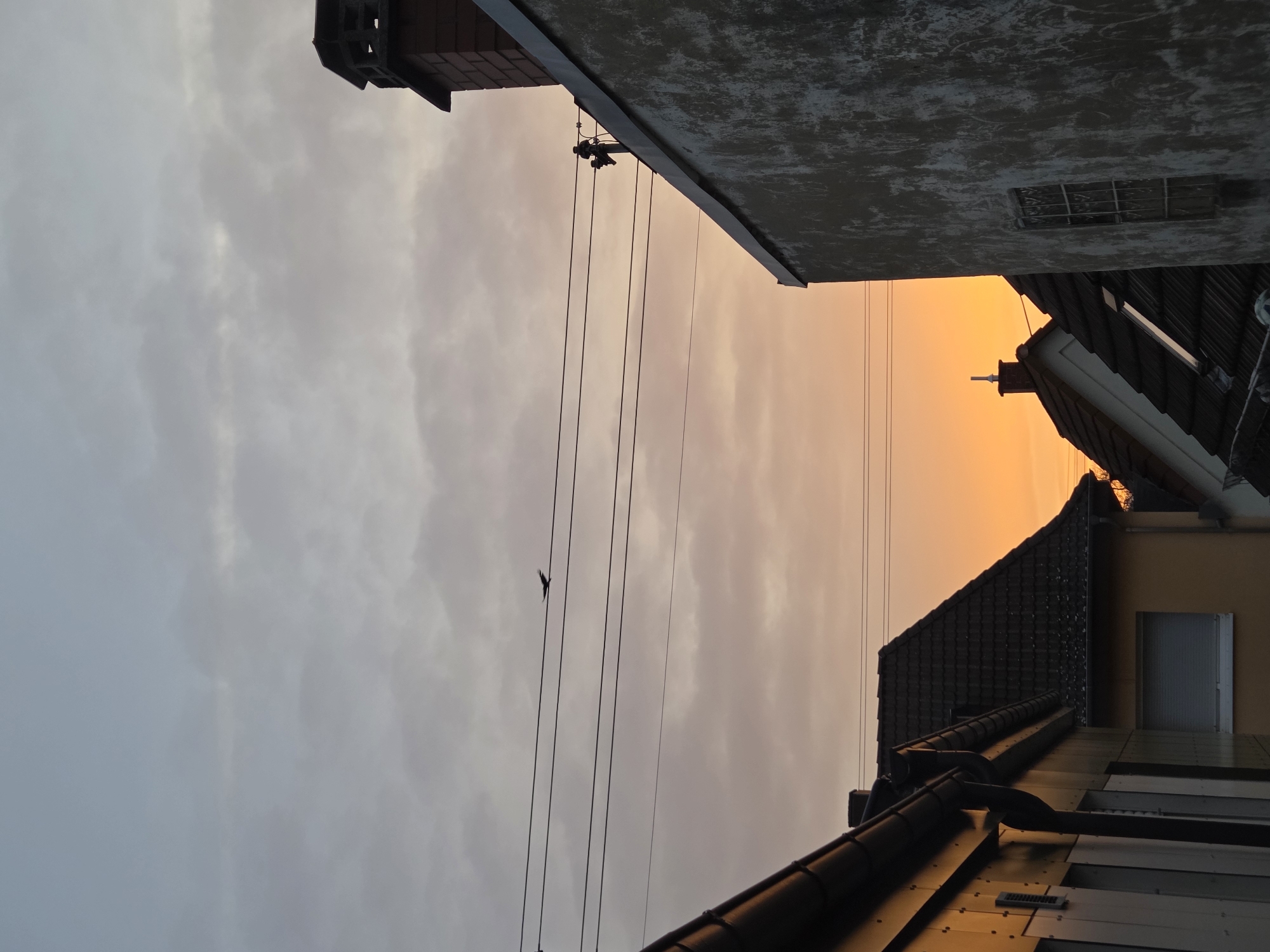 Dawn breaks over Ludwigshafen am Rhein with dramatic sky