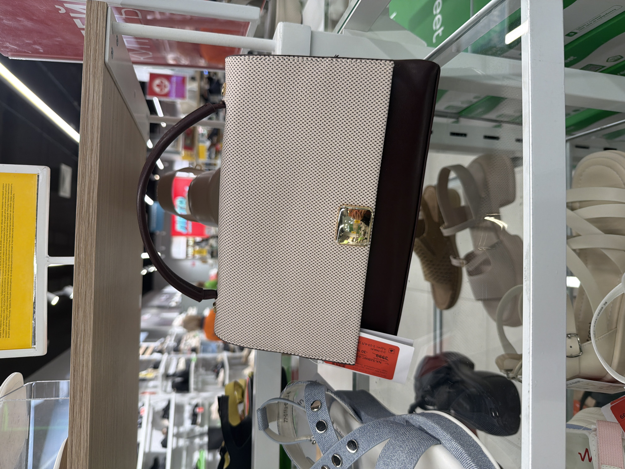 Browsing bags and shoes across a multi-level mall