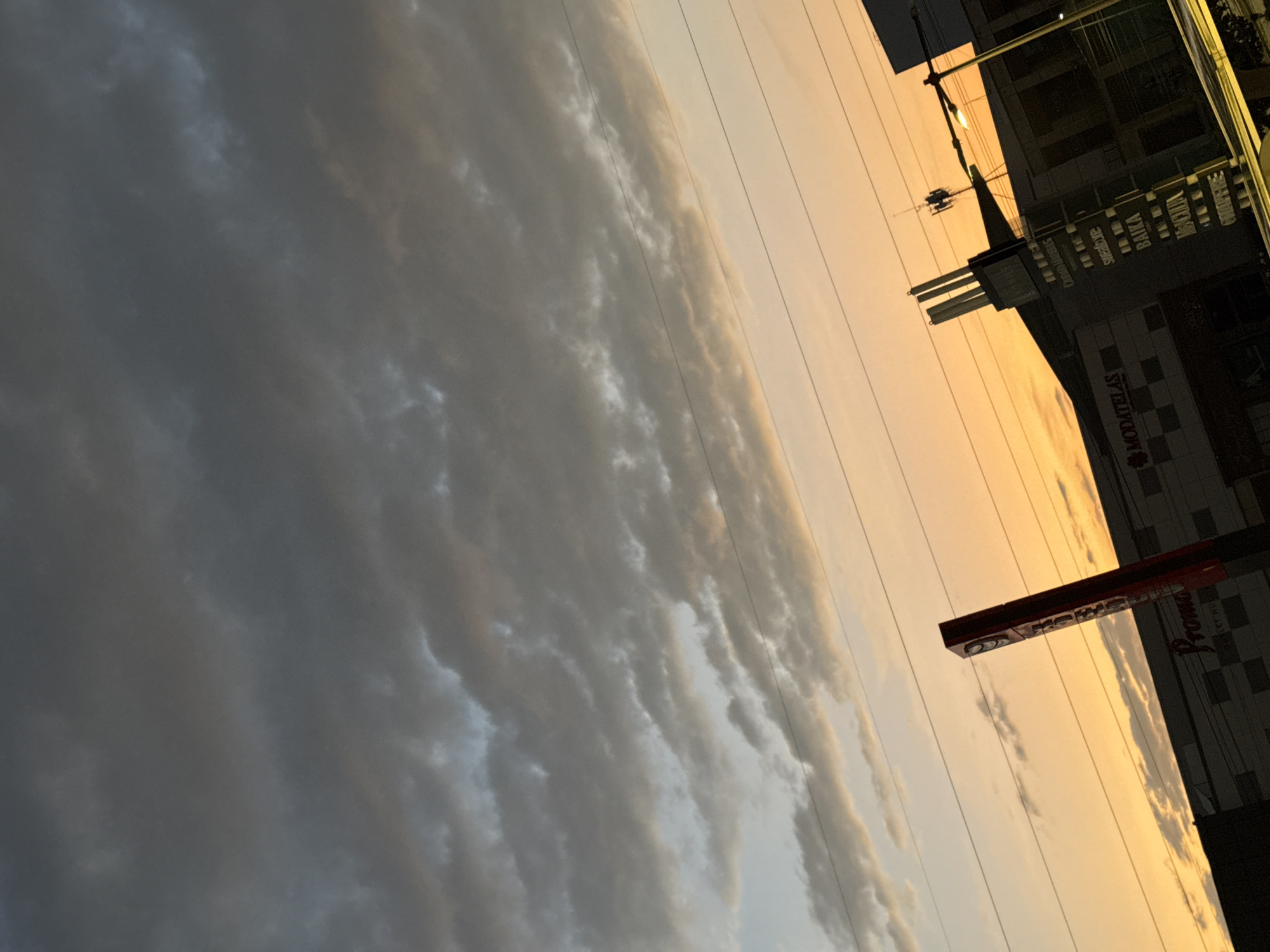 Dawn or dusk captured over modern Puebla architecture
