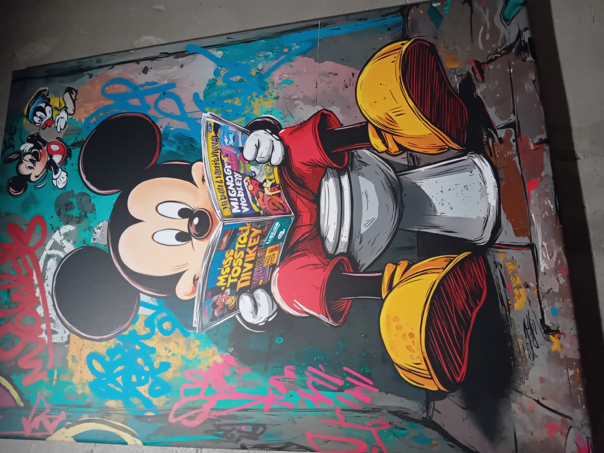 Mickey Mouse painting spotted reading comic in Barcelona