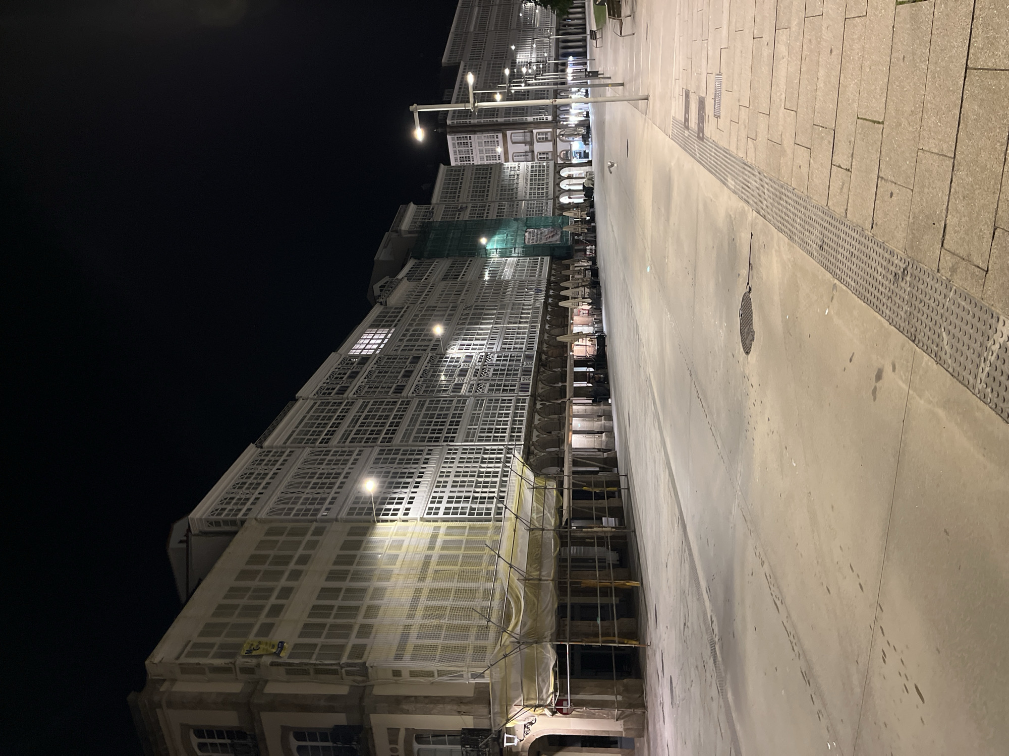 Nighttime architectural and marina scenes documented in A Coruña