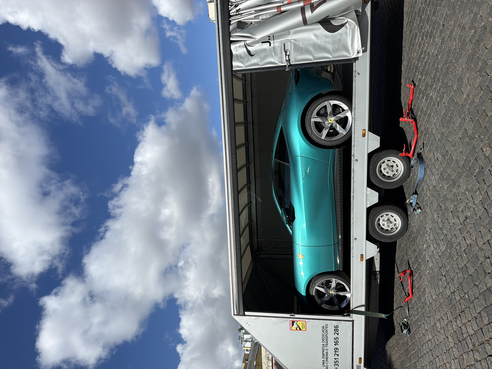 Car carrier with Ferrari spotted on Lisbon street