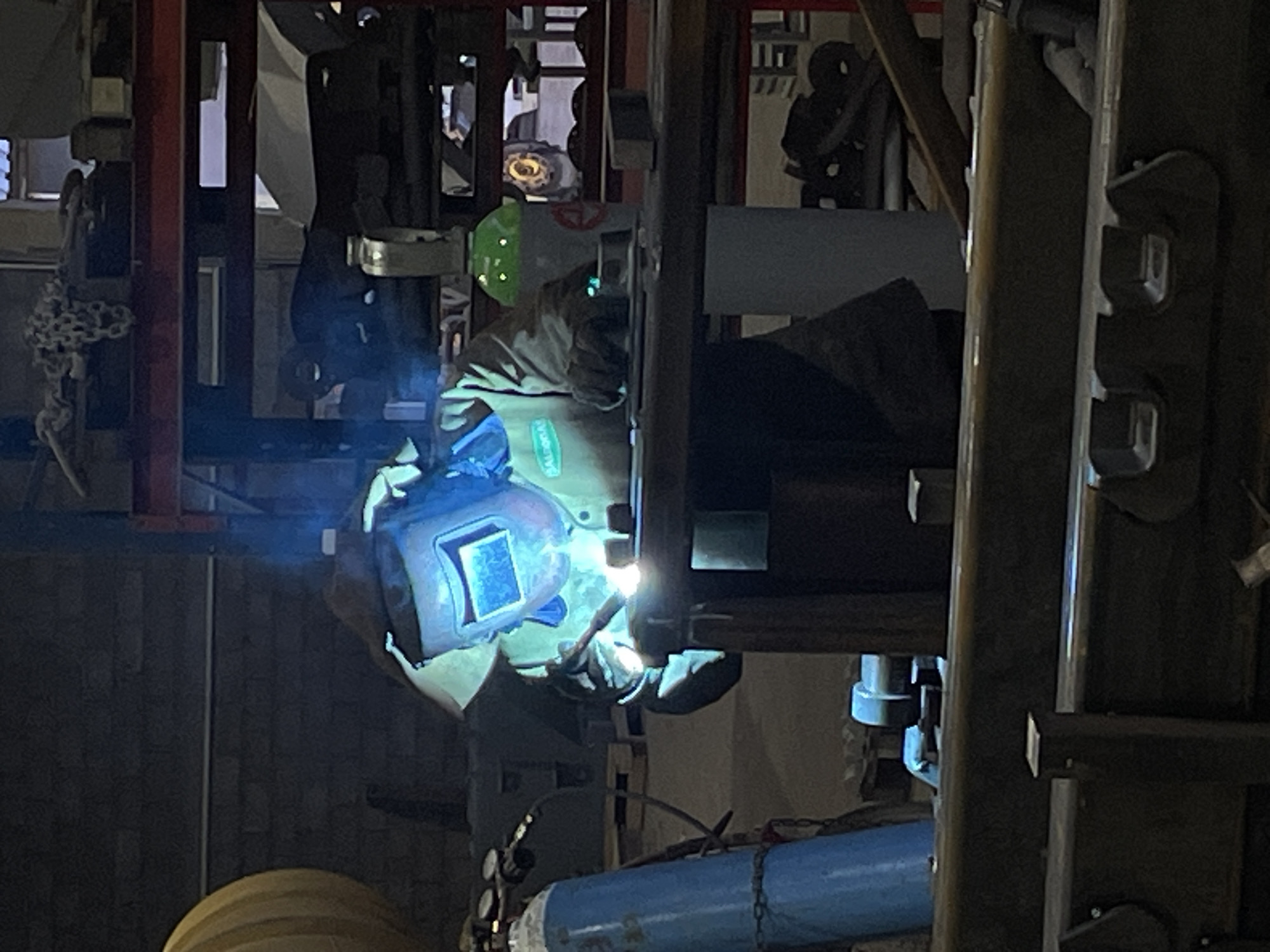 Welder in protective gear works industrial site Montenegro