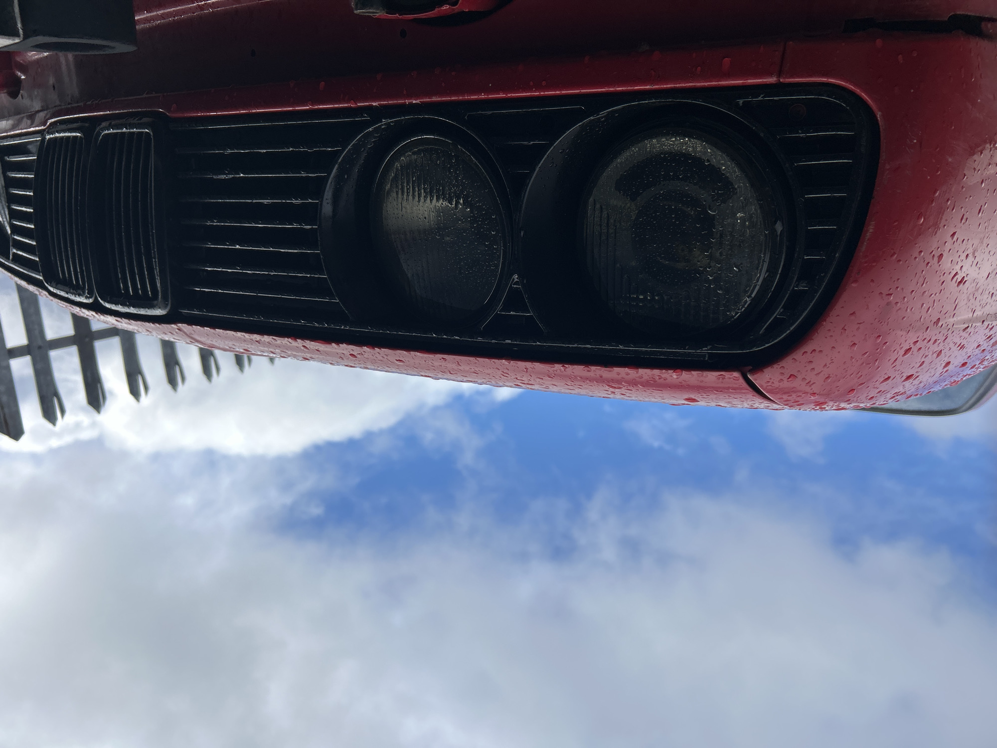 Red car towed in Shotts industrial area