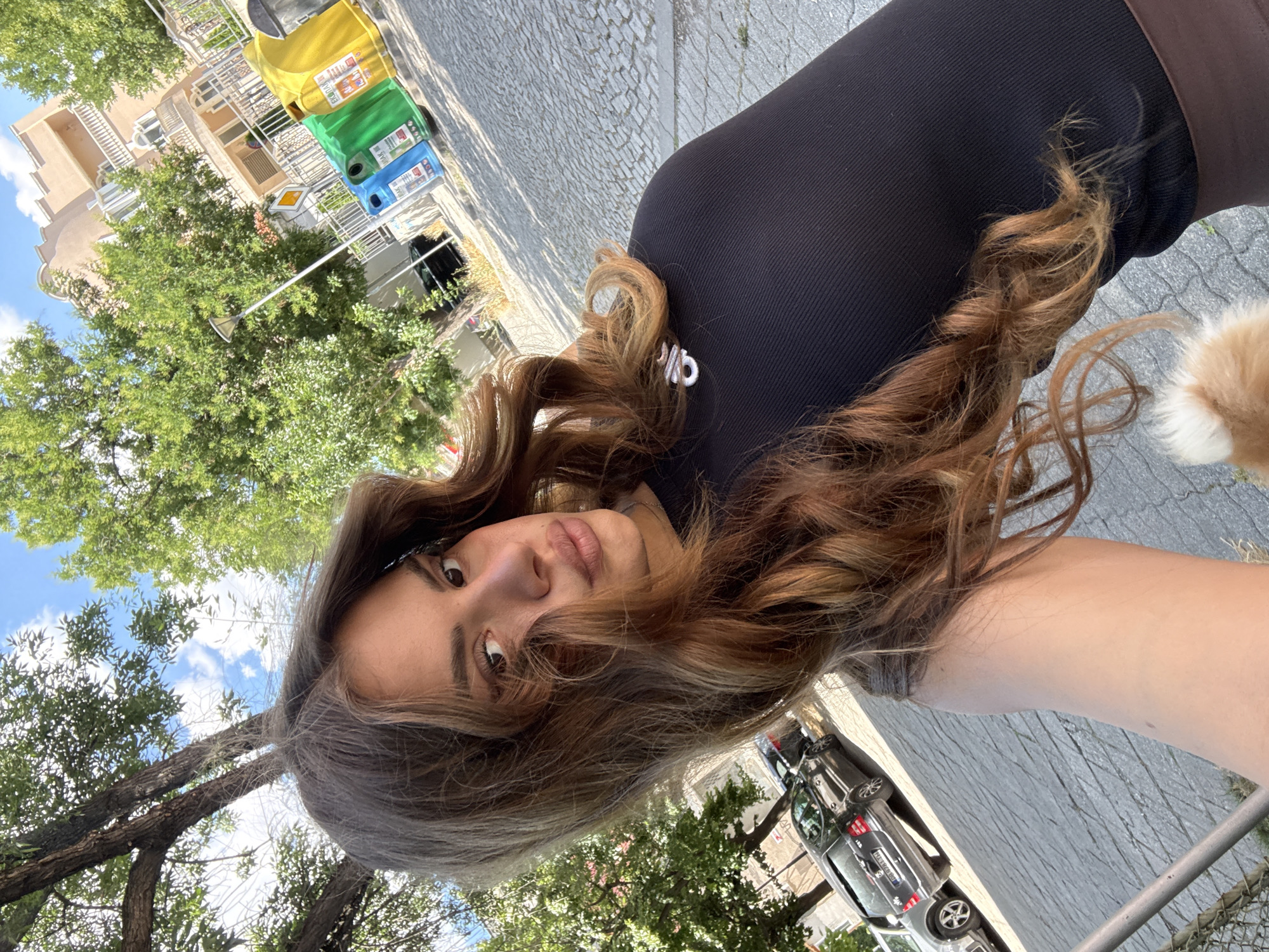 Selfies and a Pomeranian on a Plovdiv sidewalk
