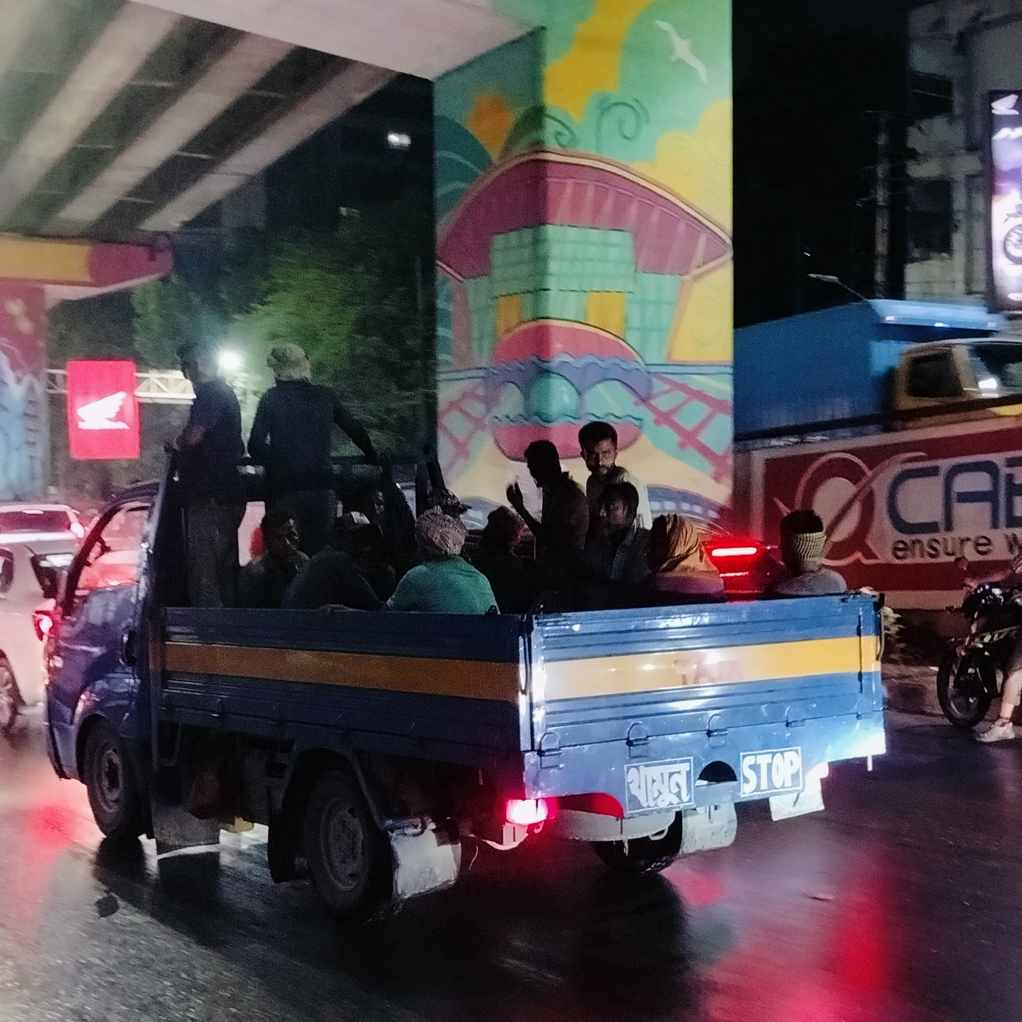 Evening street life documented in Dhaka, Bangladesh