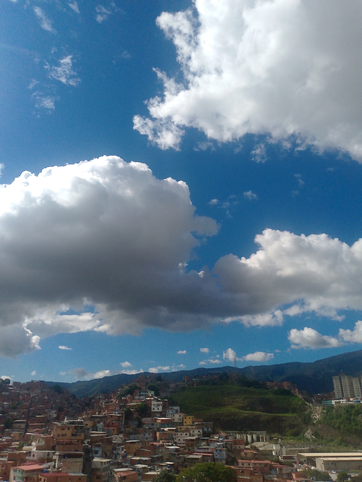 Panoramic views across Caracas hillsides on a cloudy evening