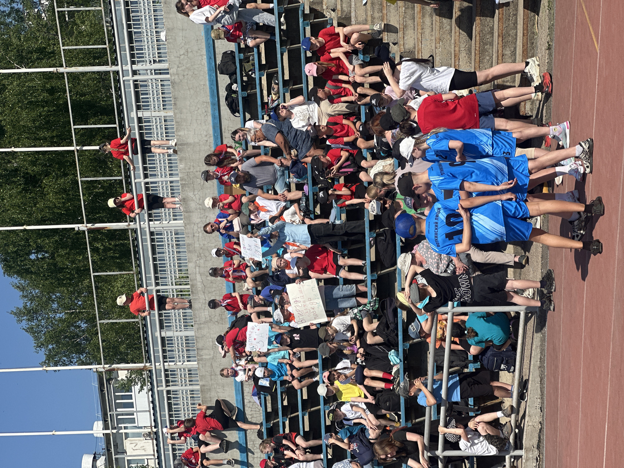 Sunny day scenes captured across Votkinsk stadium, cathedral, waterfront