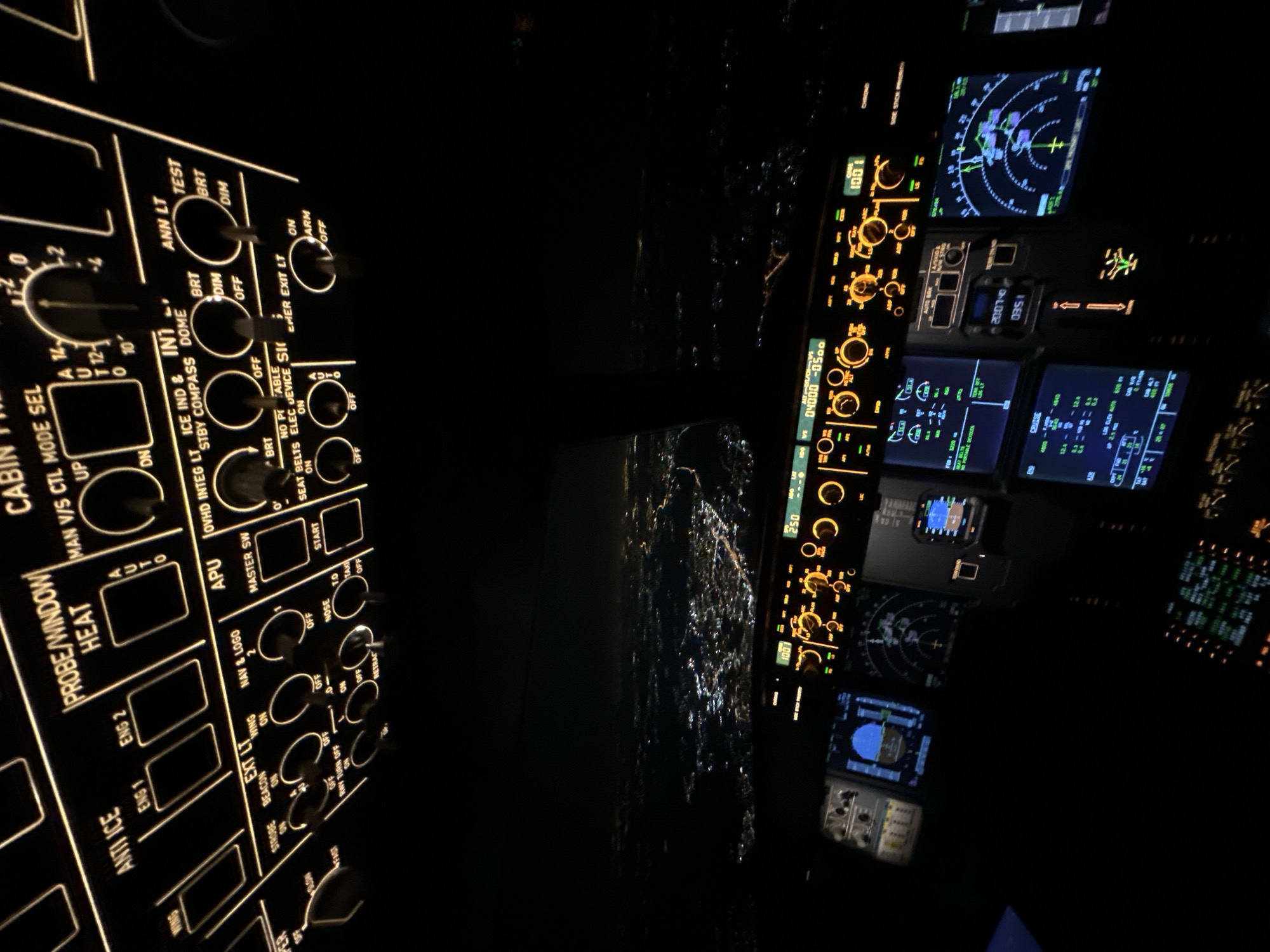 Aircraft cockpit documented during nighttime flight operations over Khimki
