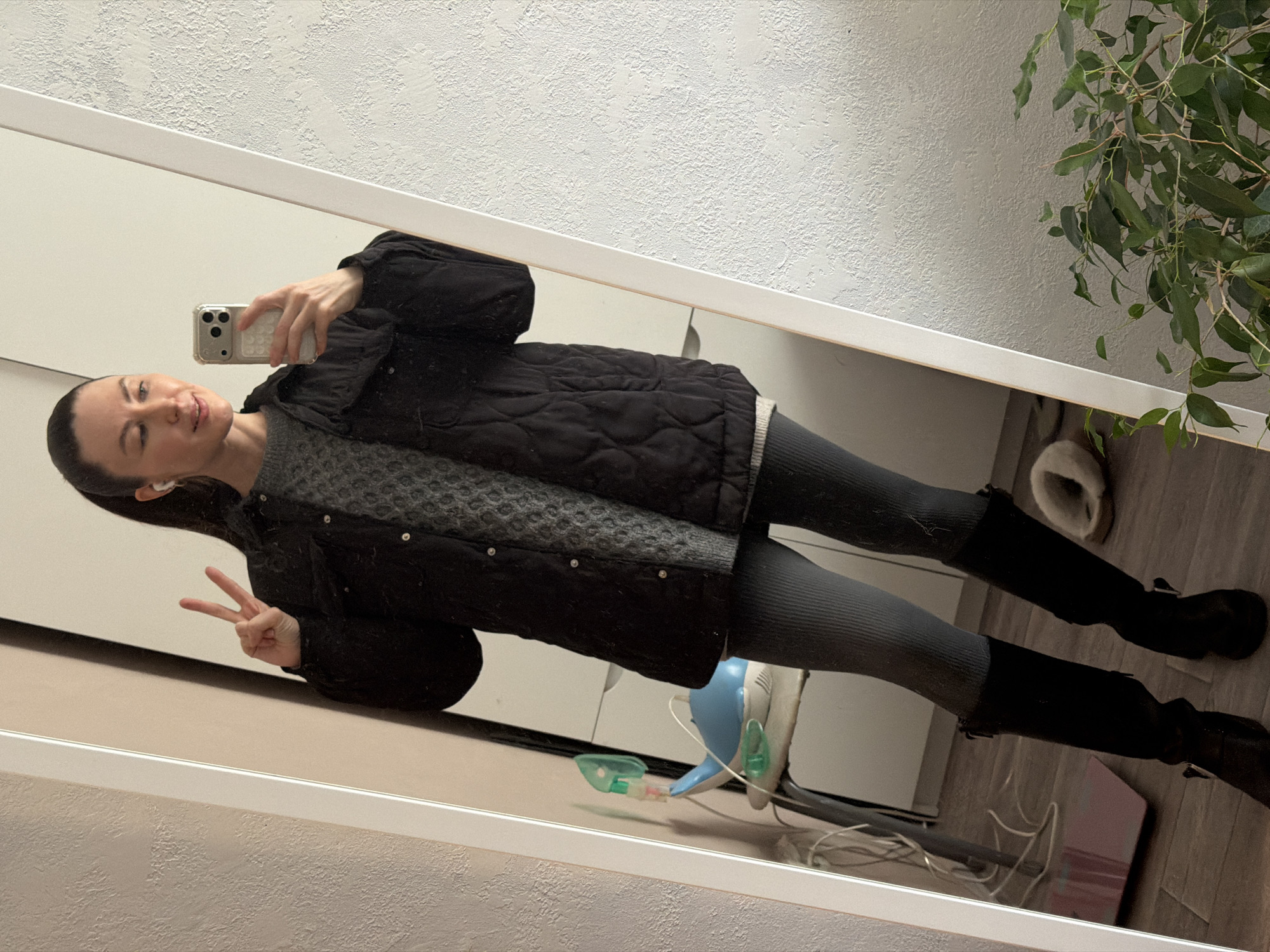 Woman takes mirror selfies at Perm residence