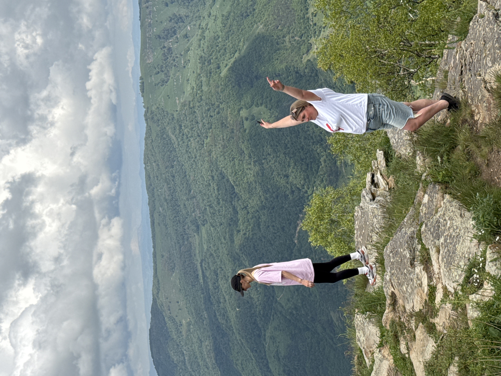 Tourists explore Russian mountain region via off-road vehicles, campfires