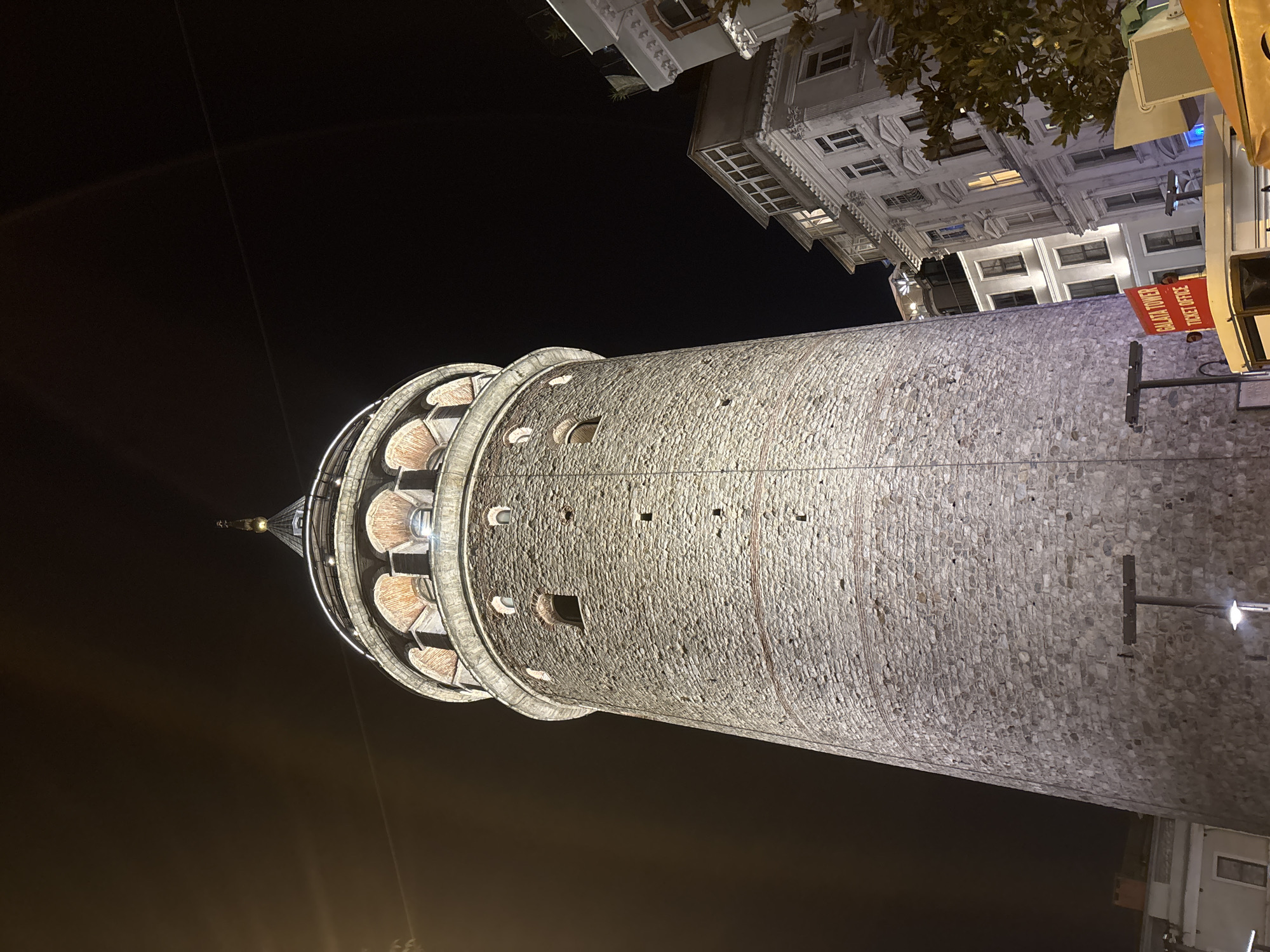 Galata Tower glowing at night in Beyoğlu, Istanbul