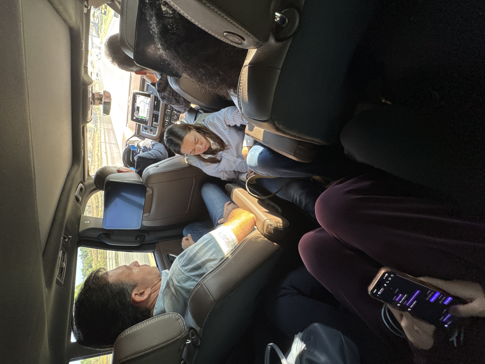 Passengers travel in vehicle with monitors near Mexico City