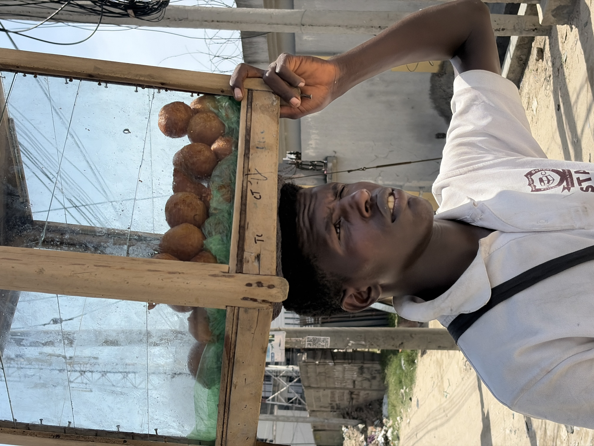 Daily commerce and street scenes documented across Nigerian towns