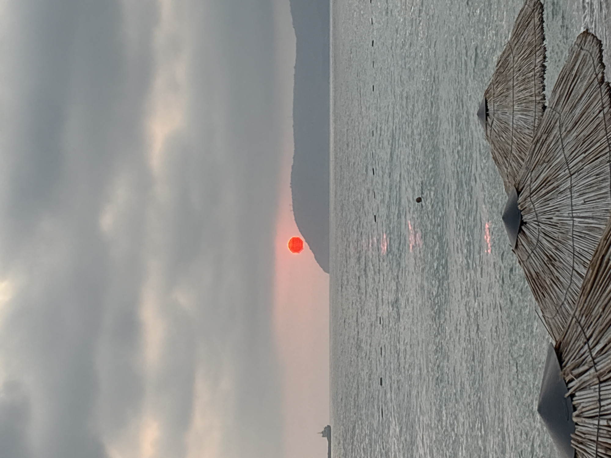 Sunset hour on the pebble beaches of Bar, Montenegro