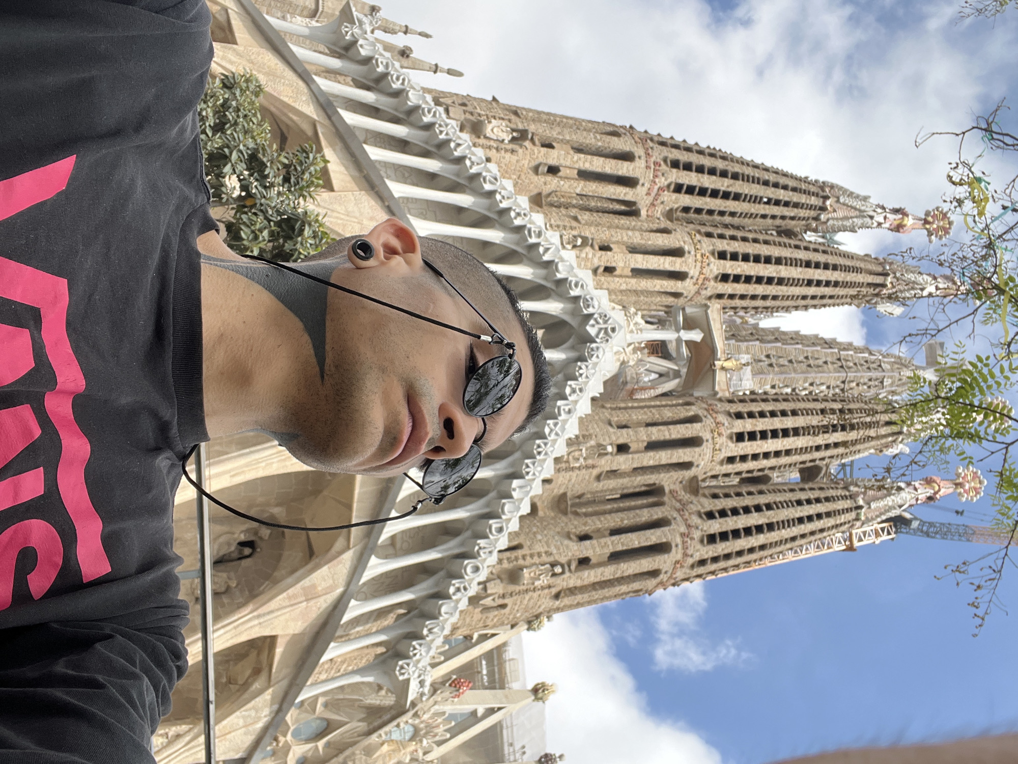 Tourist photographed at Barcelona's Sagrada Familia basilica