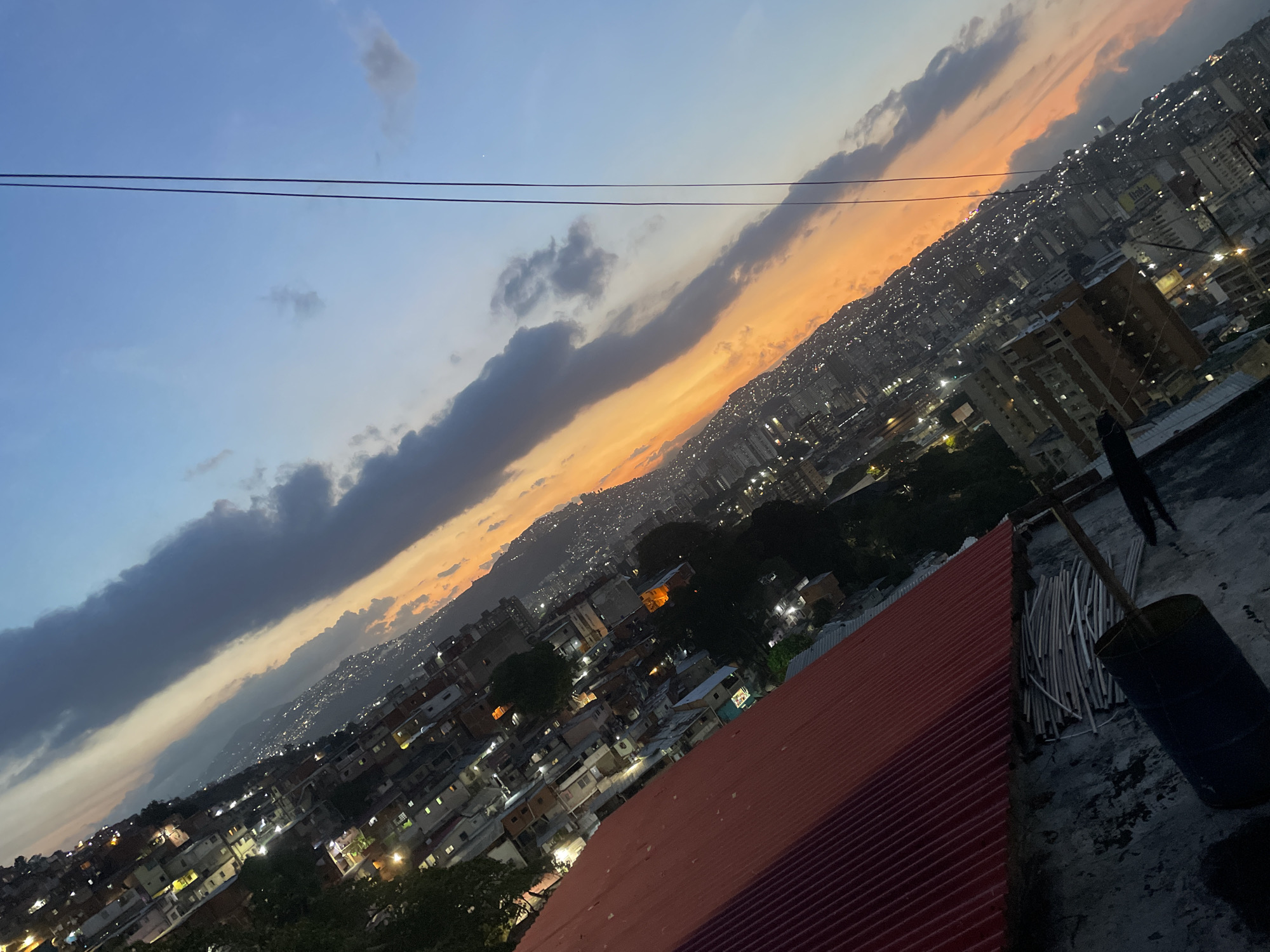 Caracas cityscape photographed from elevated perspective during sunset