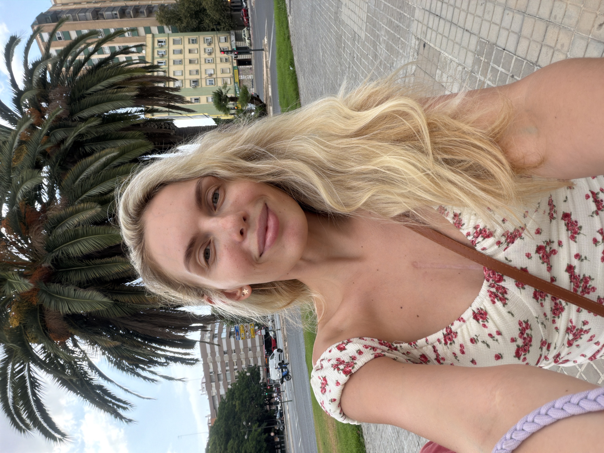 Selfie moment among palm trees in València, Spain