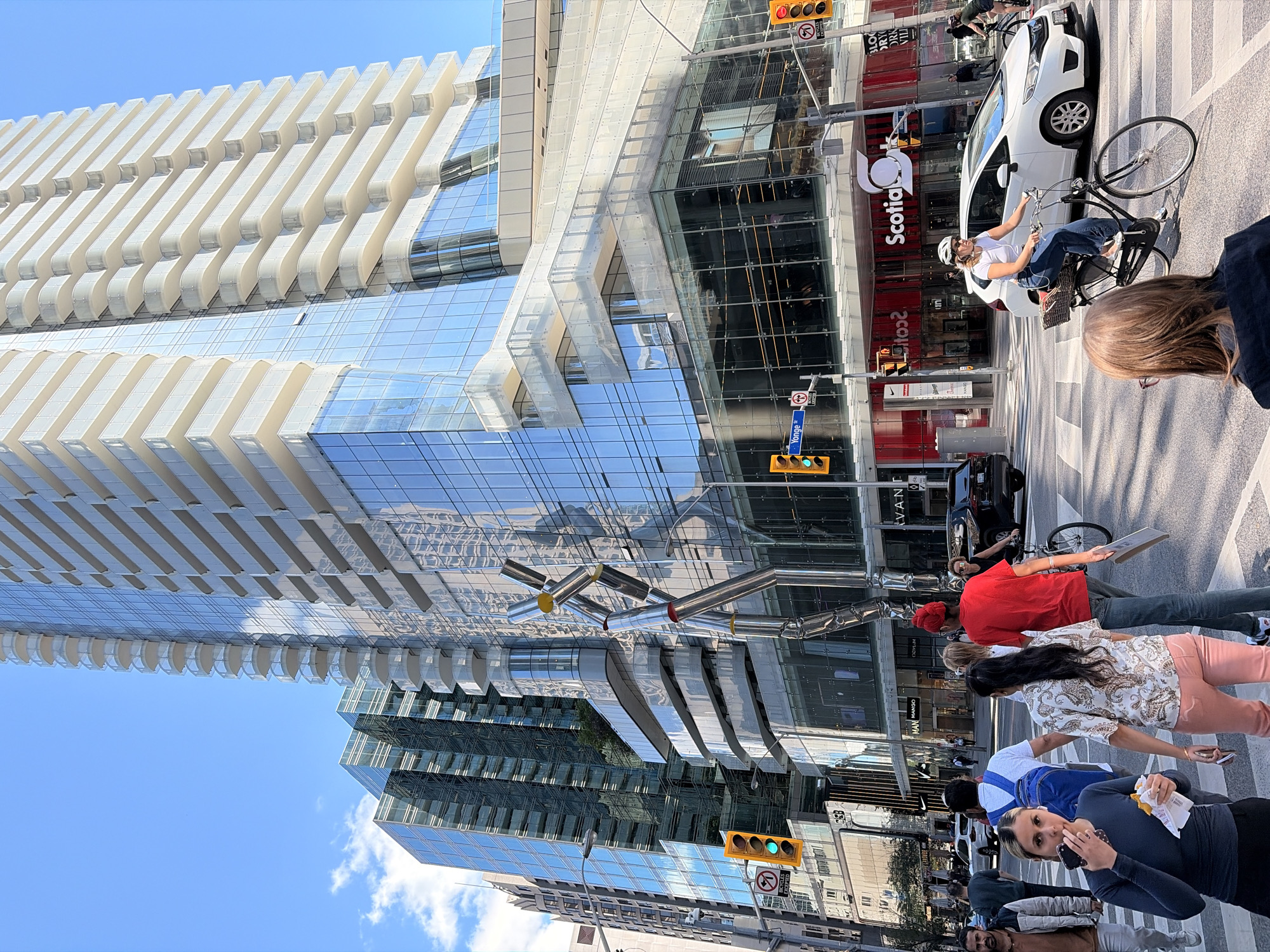 Pride parade energy meets luxury retail on a sunny Toronto afternoon