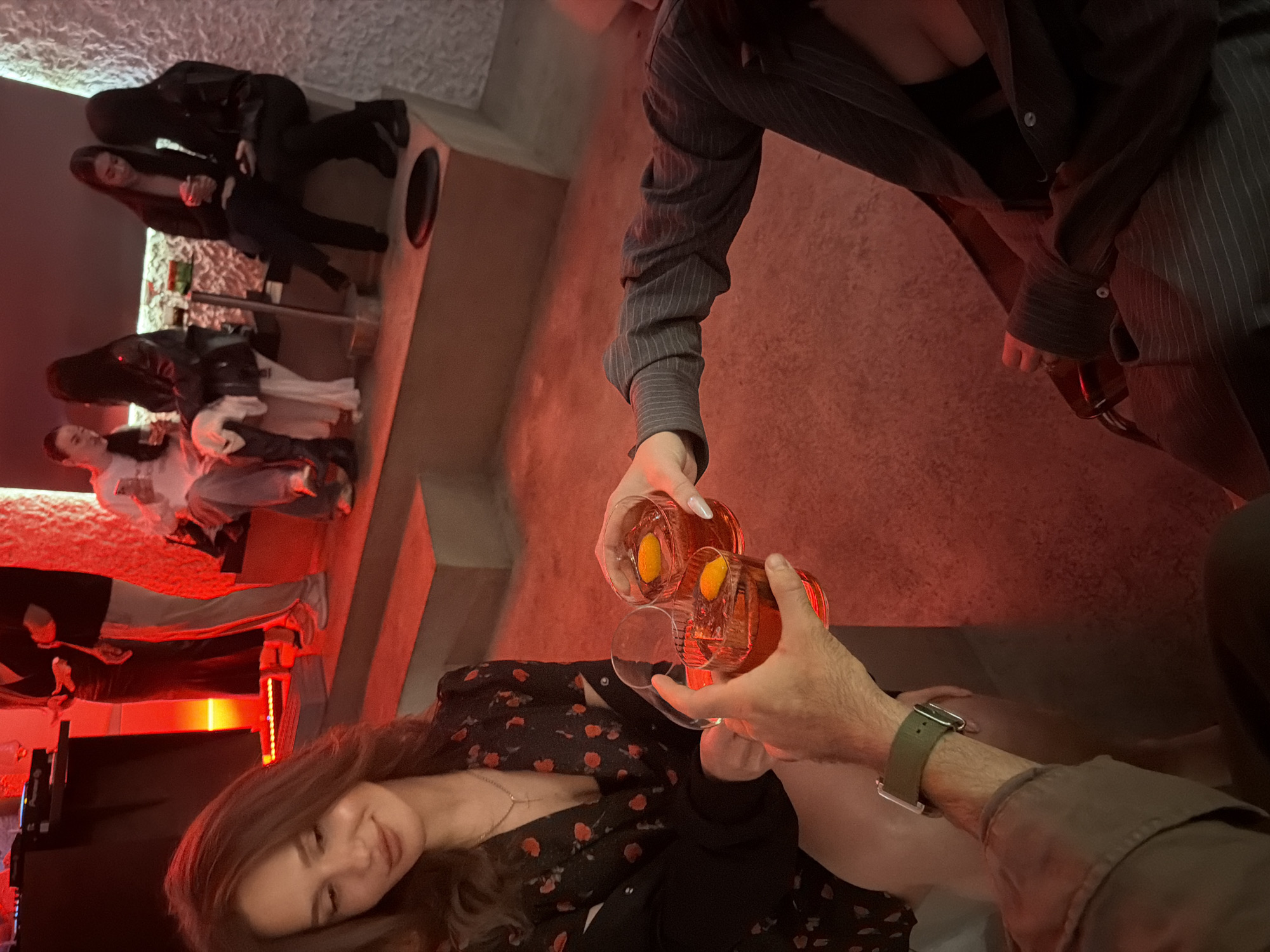 Red-lit bar night in Warsaw, drinks and selfies