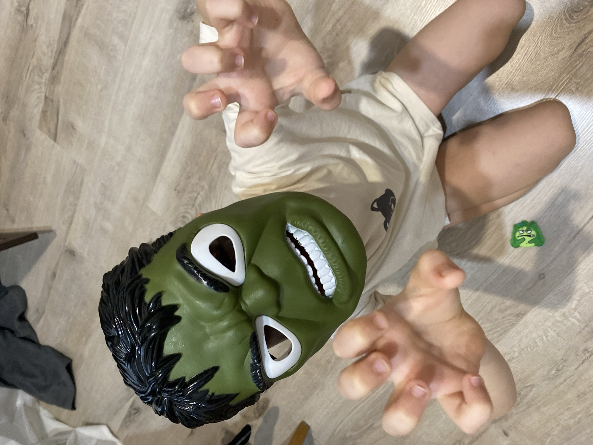 Child plays with balloons at home in Chaikovsky