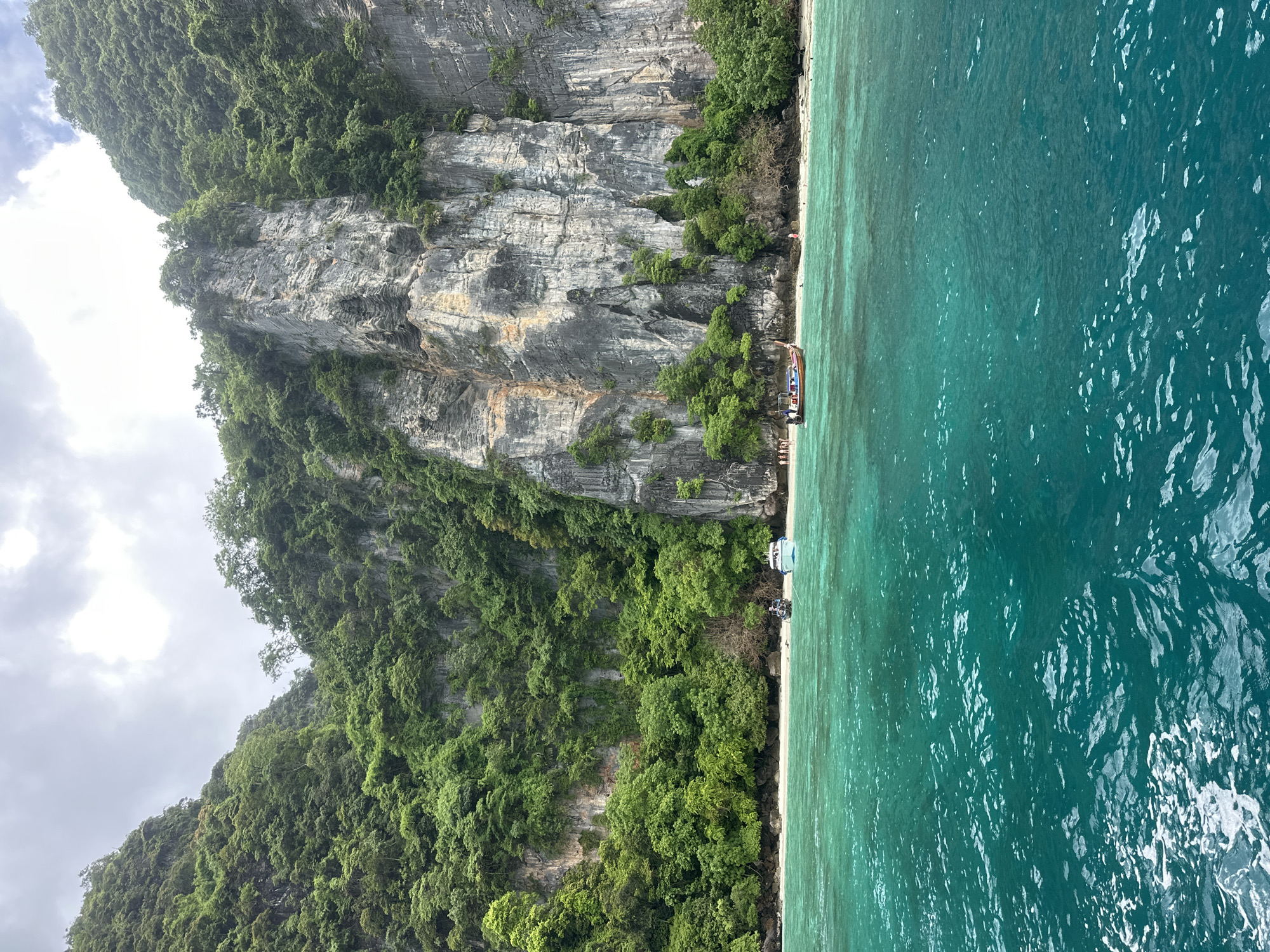 Boats, cliffs, and clear water around Ao Nang