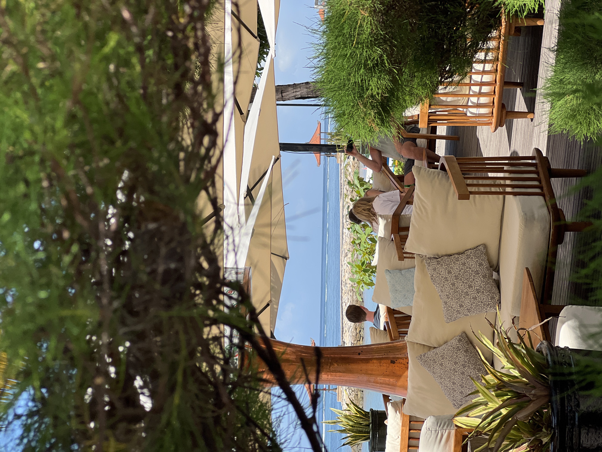 Morning scenes document quiet resort and beach life in Denpasar