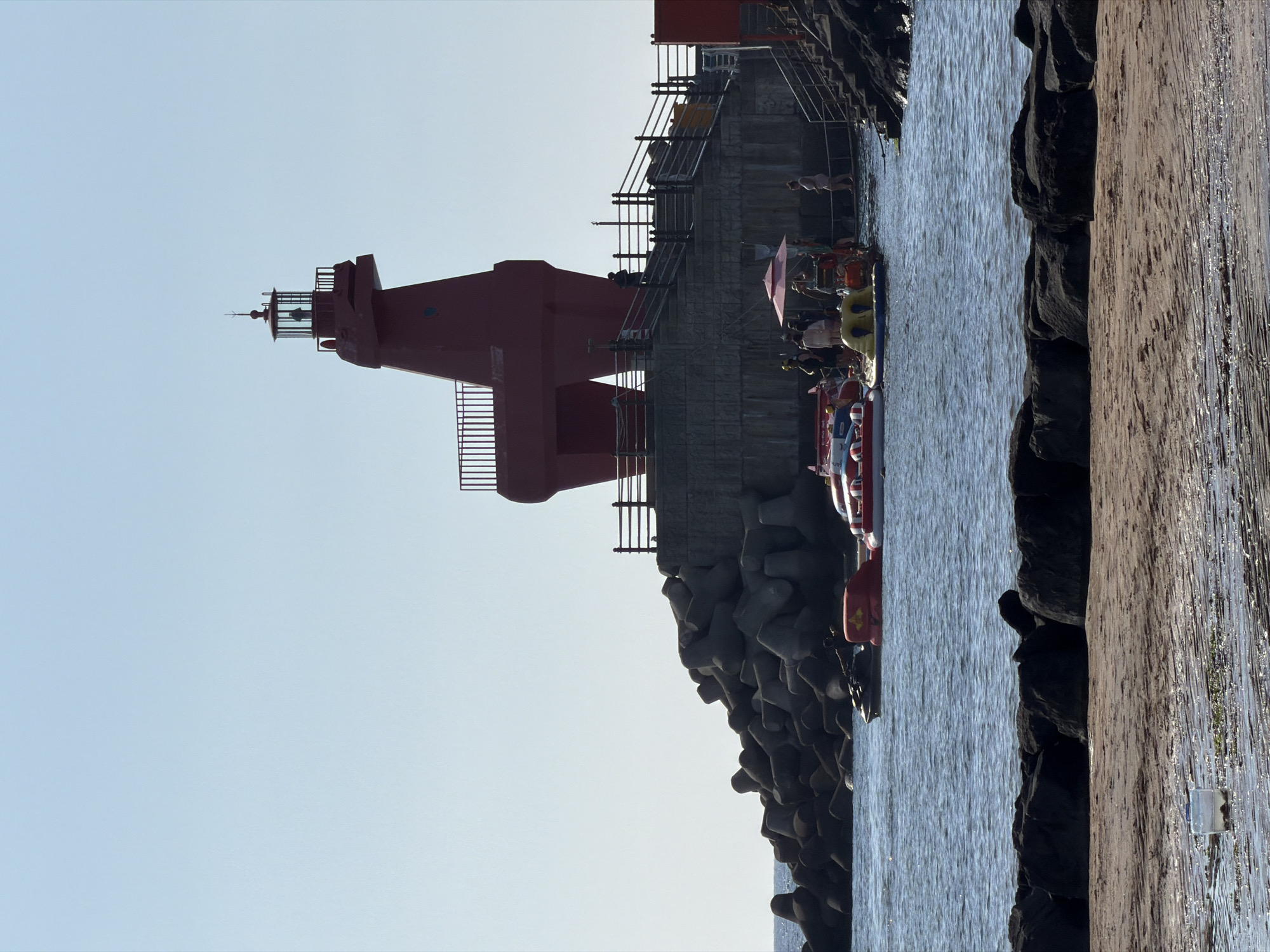 Sunny morning on Jeju's coast, beaches and tidal flats busy