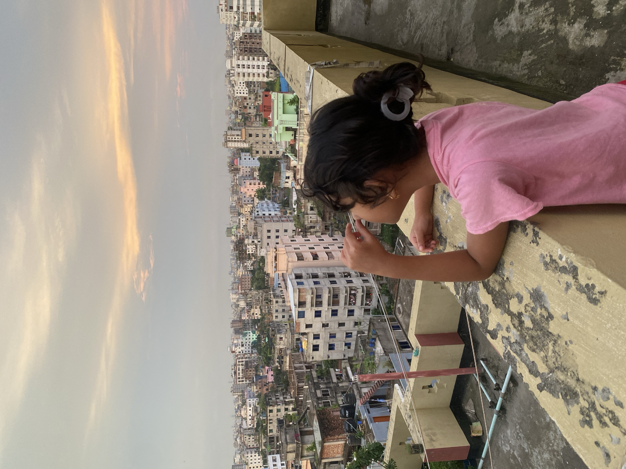 Rooftop views over Dhaka at dusk, July 2026
