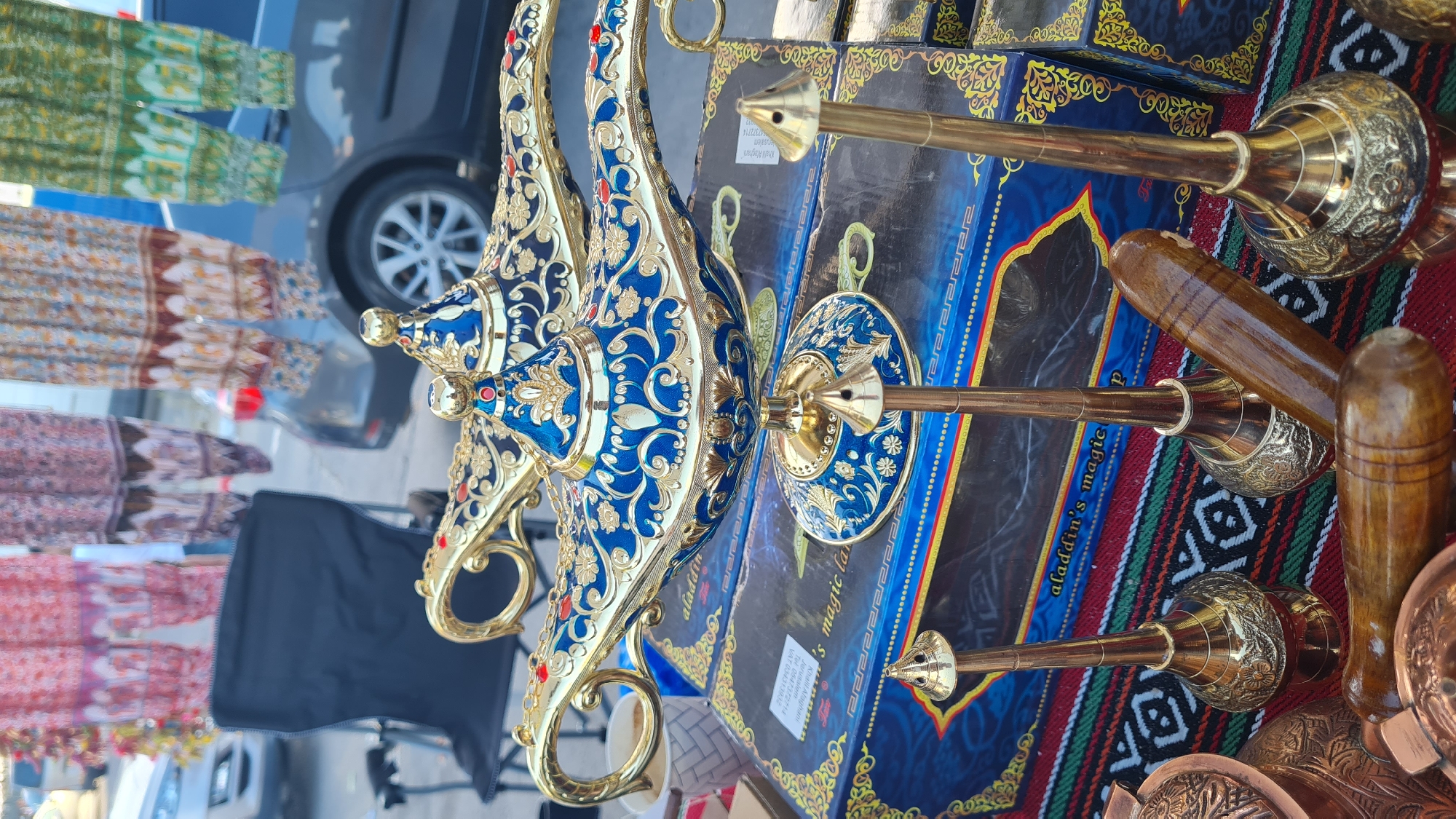 Vendor displays ornamental magic lamps at Kiryat Gat market stall