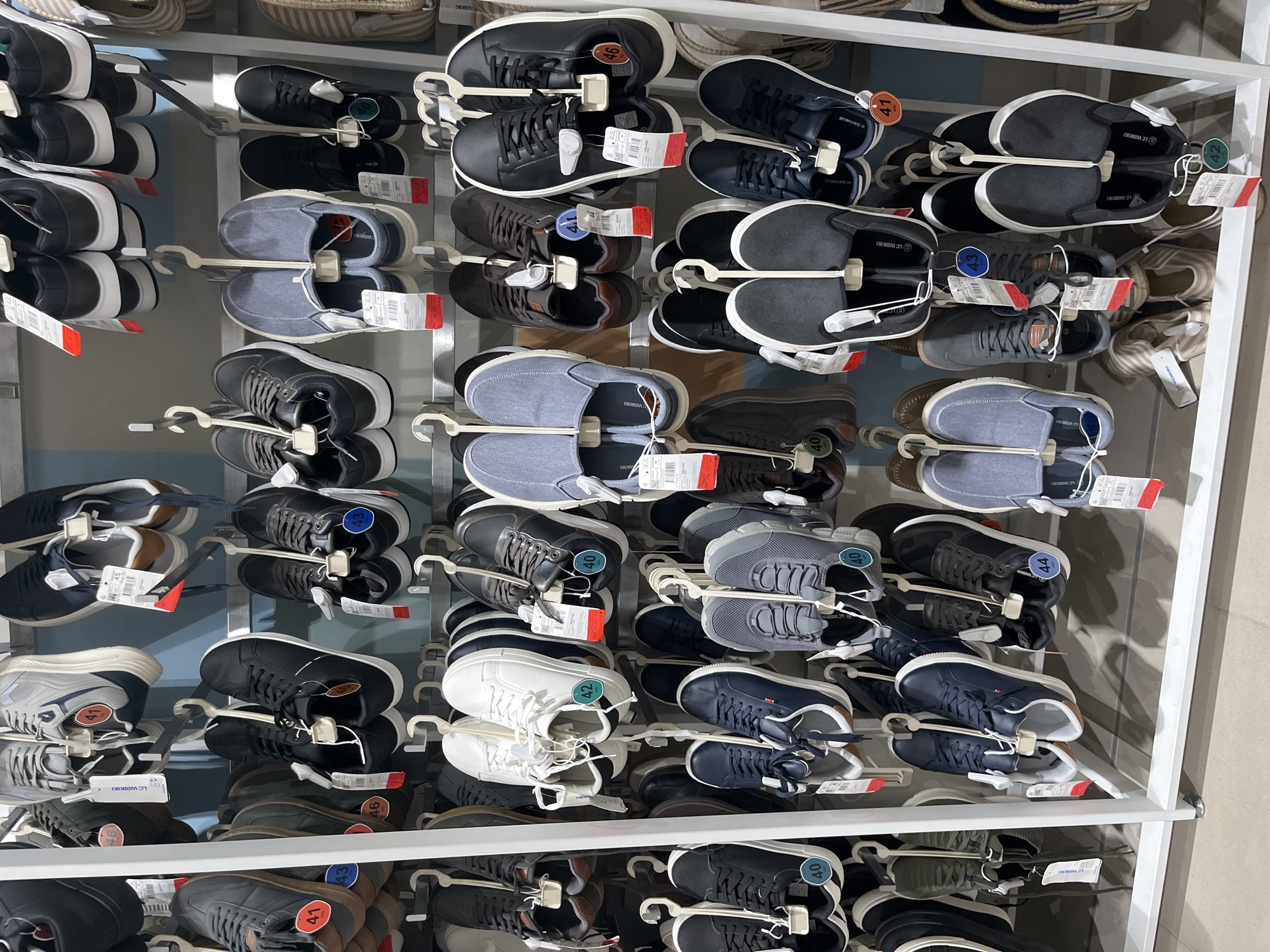 Inside a Kharkiv retail store stocked with clothing and accessories
