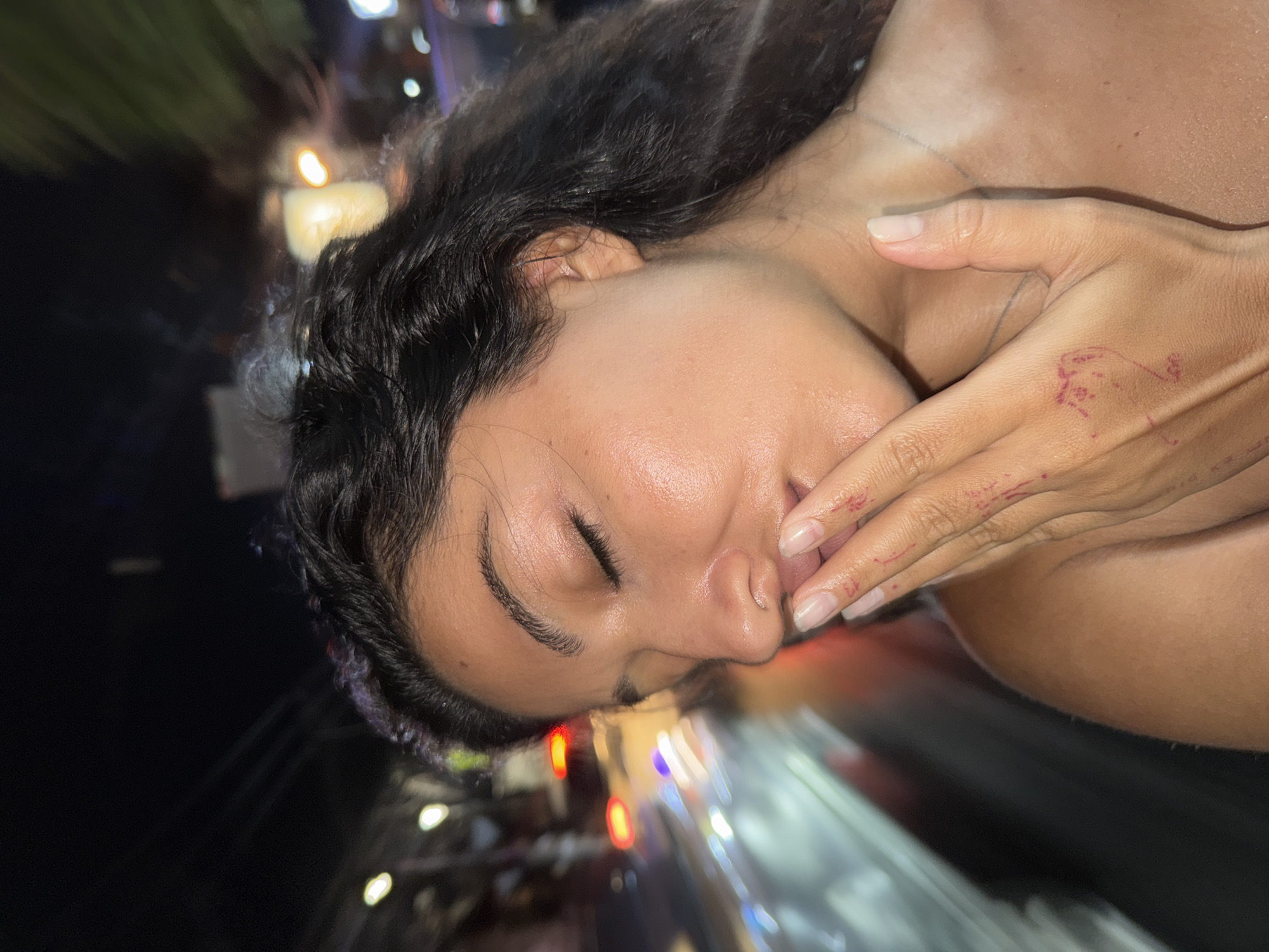 Couple takes nighttime selfies in North Kuta after rain