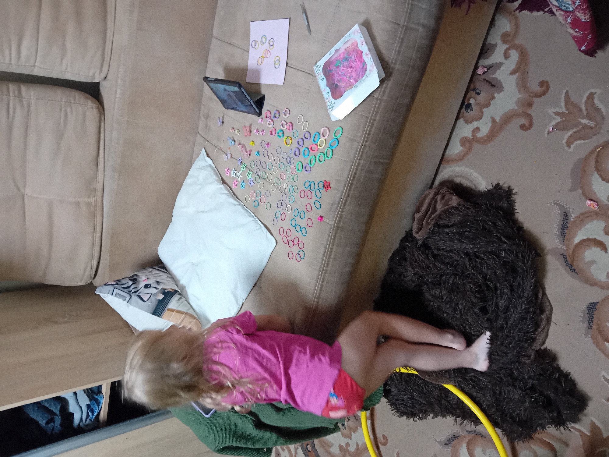 Summer afternoon in Chuhuiv: kids, a small dog, and loom bands
