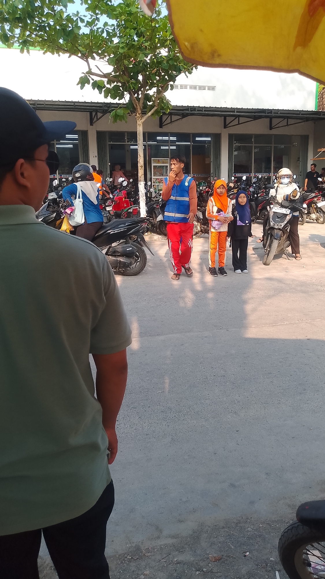 Street market morning in Karanglangu, food stalls and vendors busy
