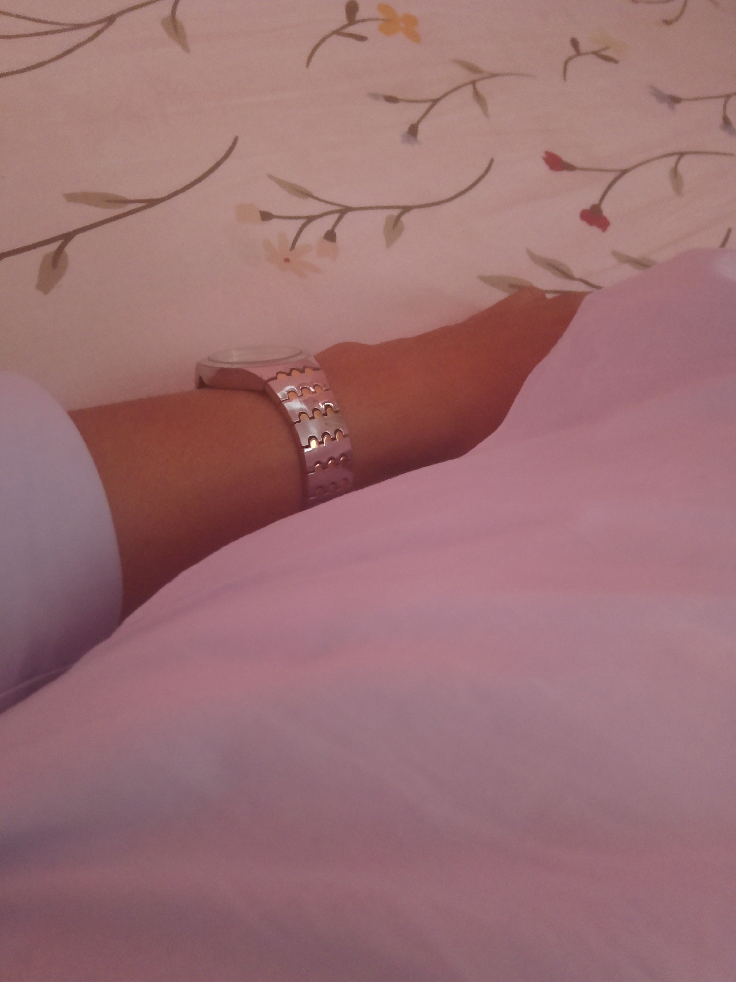 Morning bedroom moments in Mansehra with floral bedding