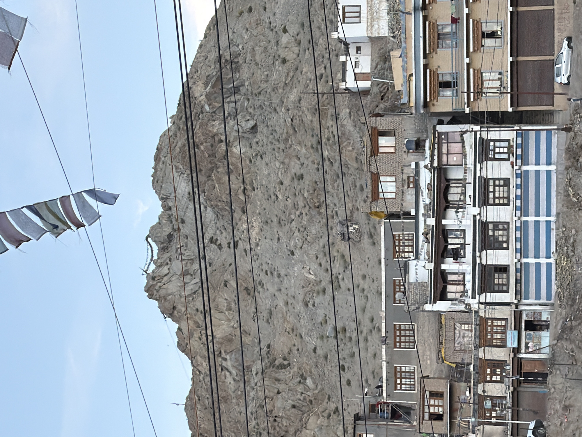 Street-level look at Leh's main drag and mountain surroundings