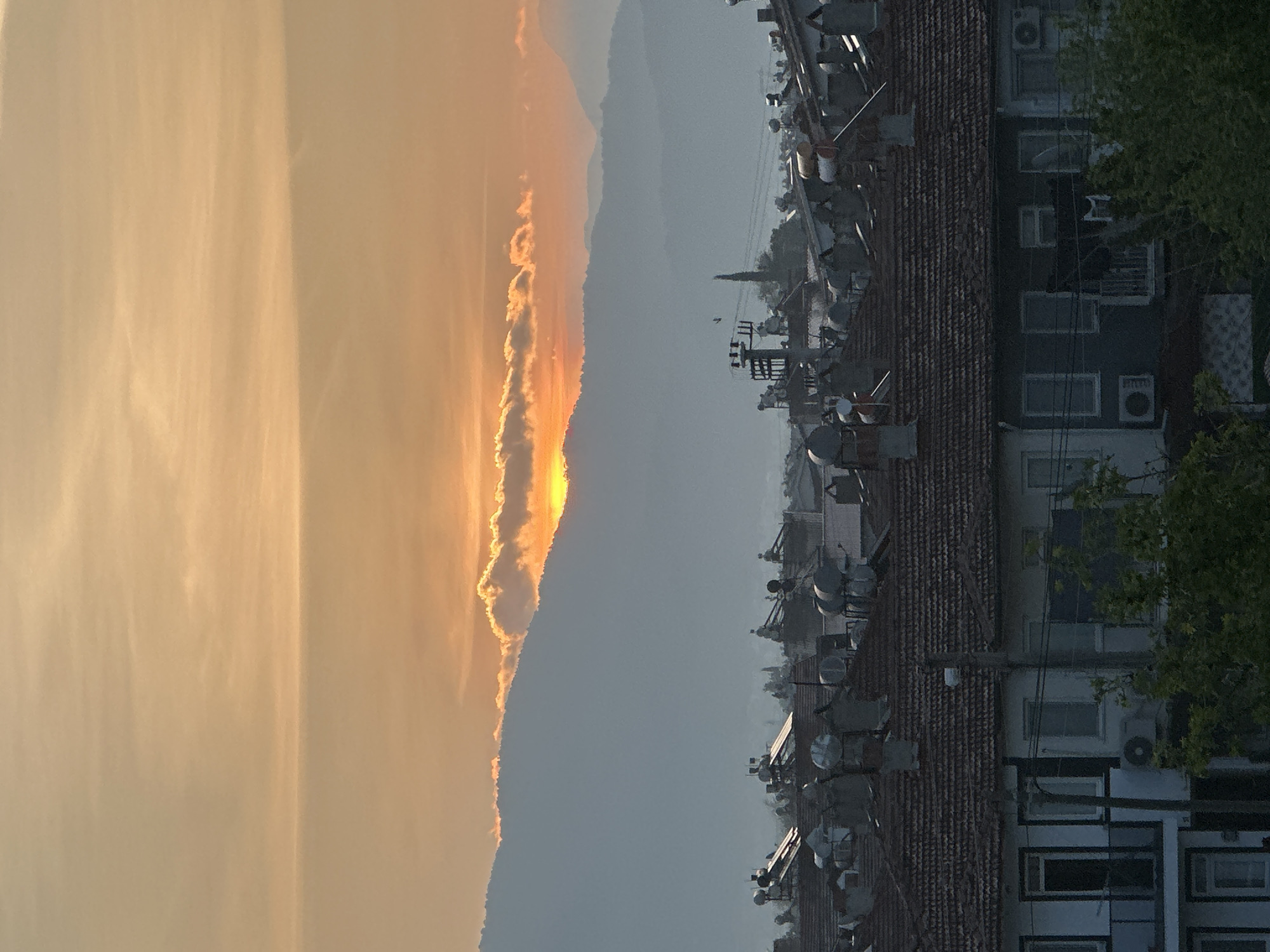 Woman documents morning routine and sunrise in Fethiye, Turkey