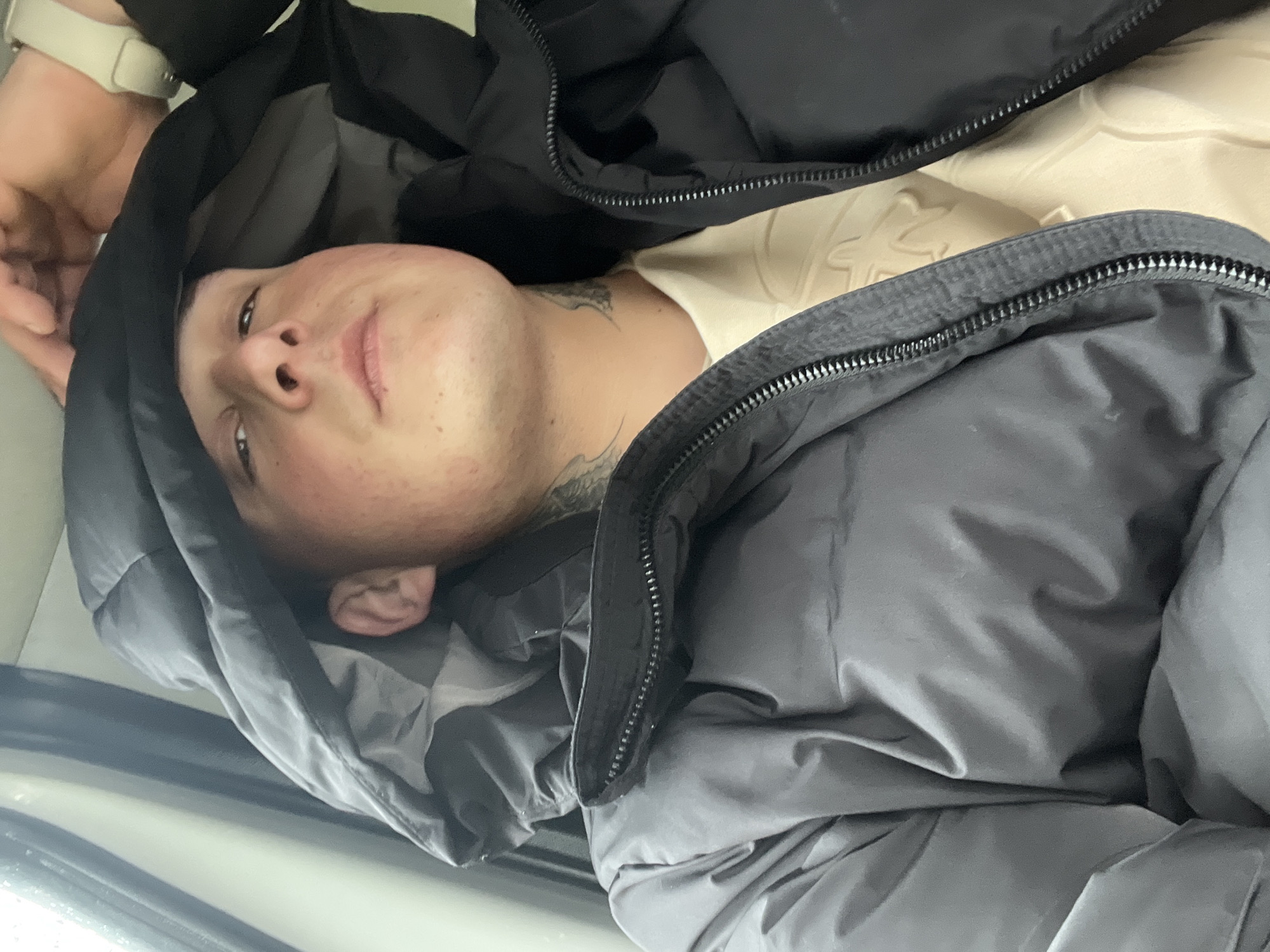 Person lying among clothing observed in Ihtiman, Bulgaria