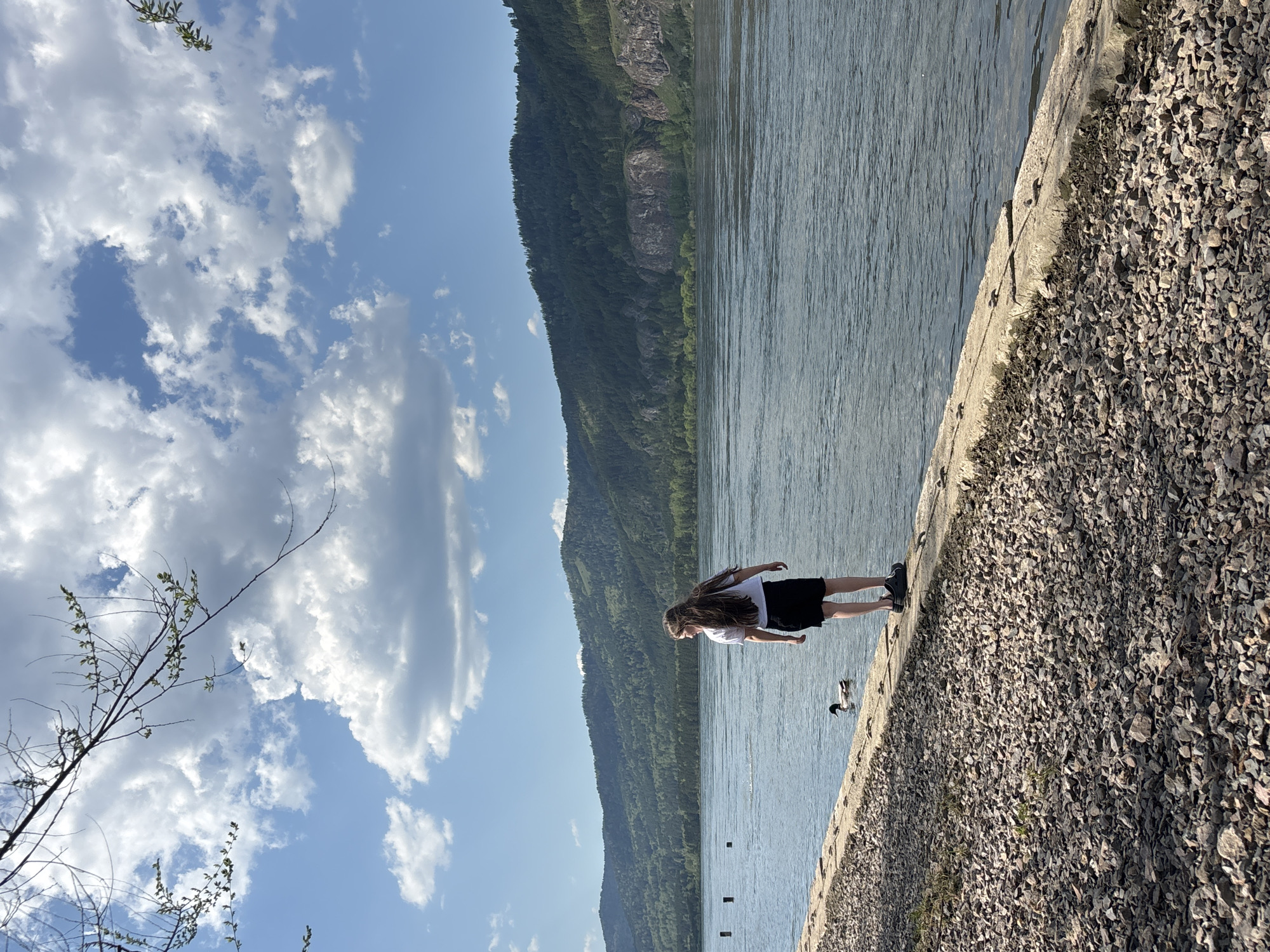 Woman spotted at riverside embankment in Овсянка, Russia
