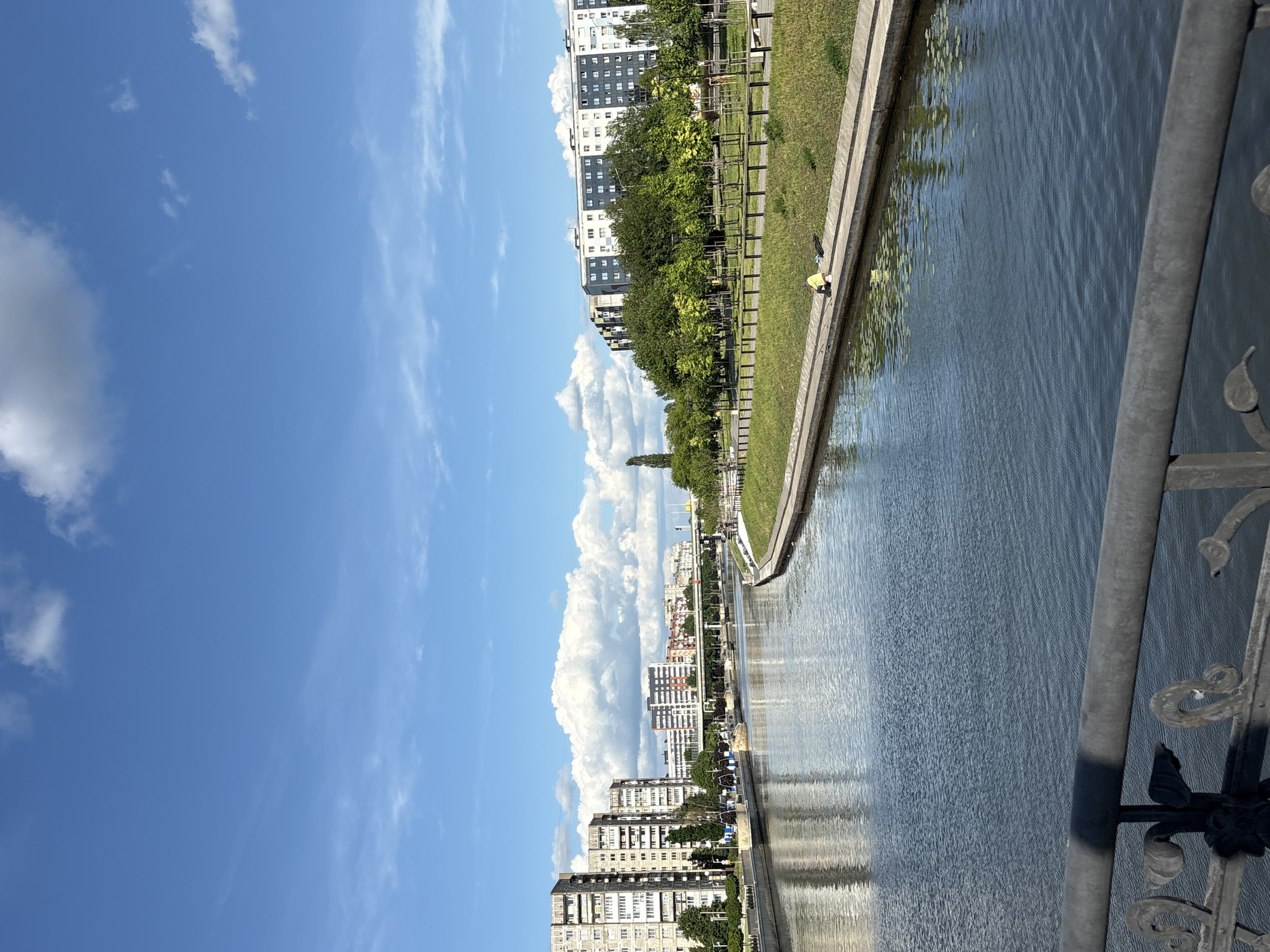 Tourist walk documents sunny afternoon in historic Kaliningrad waterfront