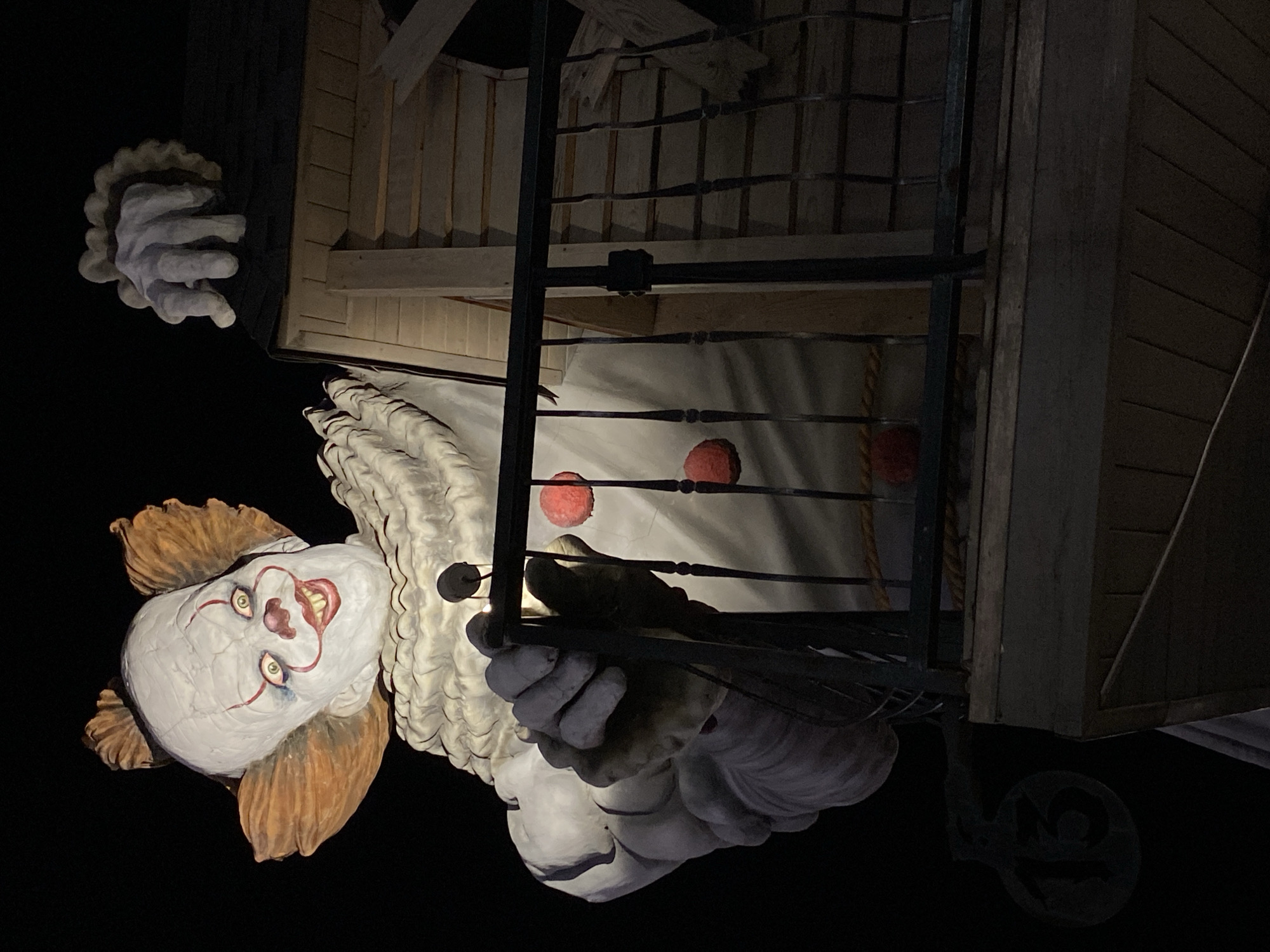 Creepy clown statue and glowing pine tree light up Gelendzhik night