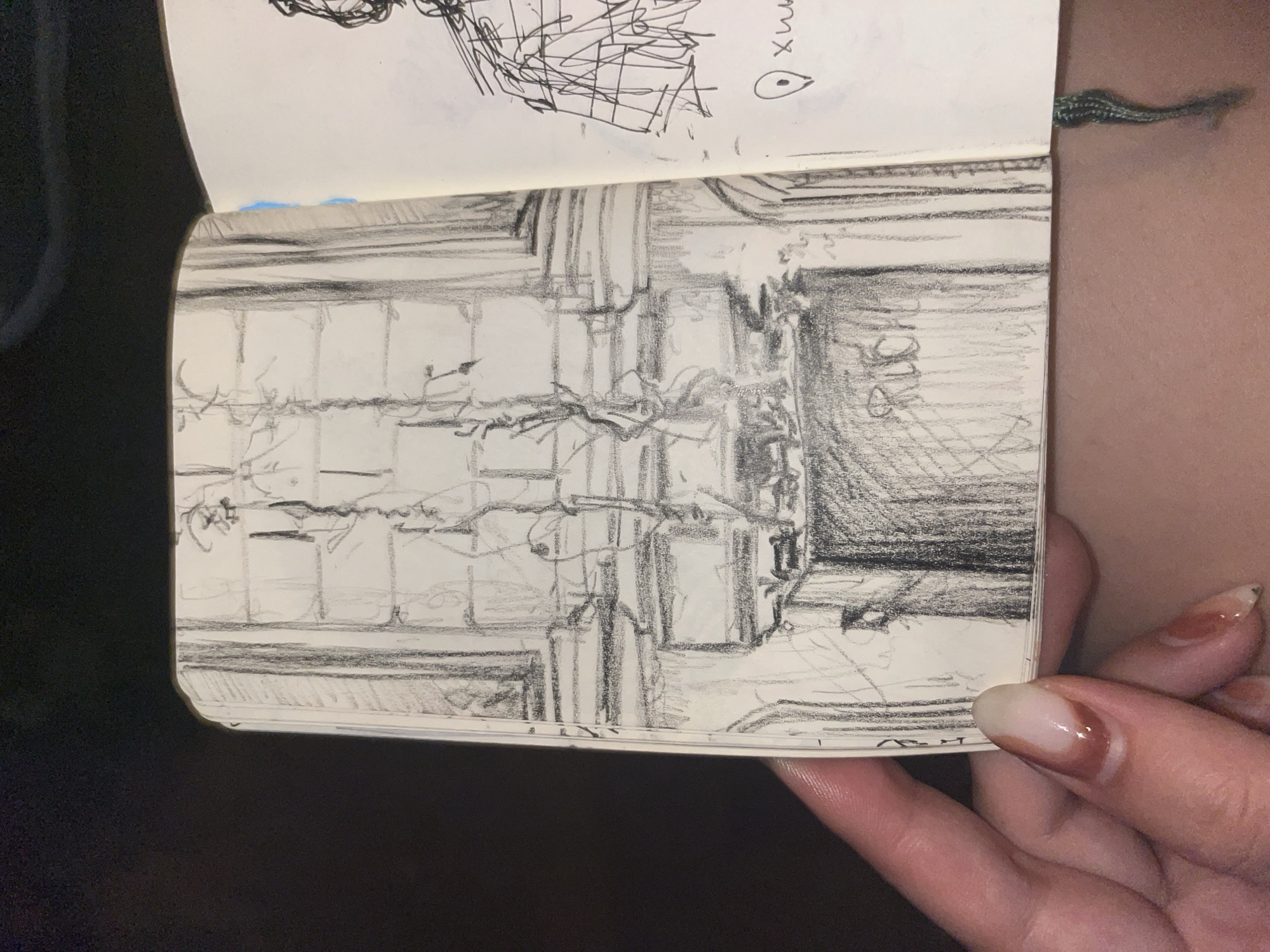 Artist fills sketchbook with diverse drawings in Greek village